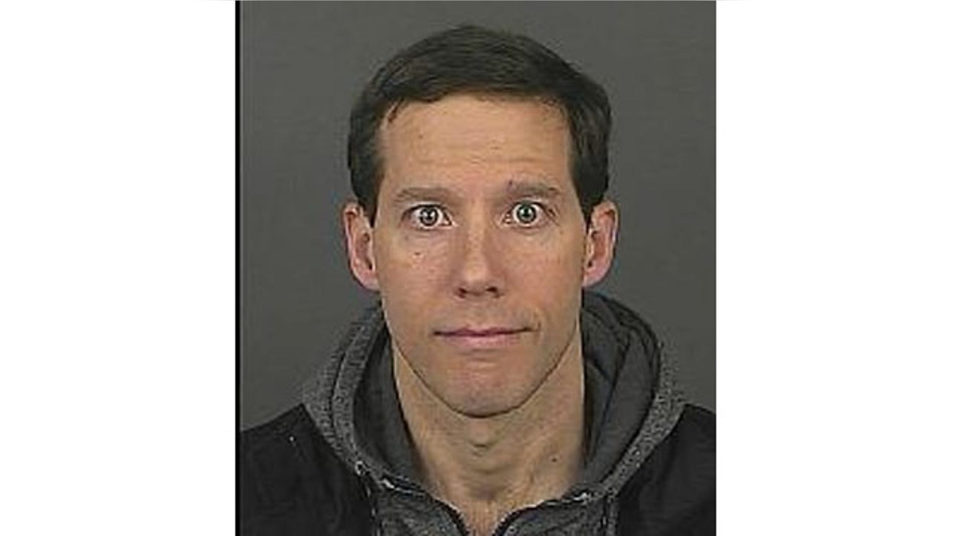 Aron Ralston's booking photo after his arrest early Sunday on misdemeanor domestic violence charges (Courtesy Denver Police)