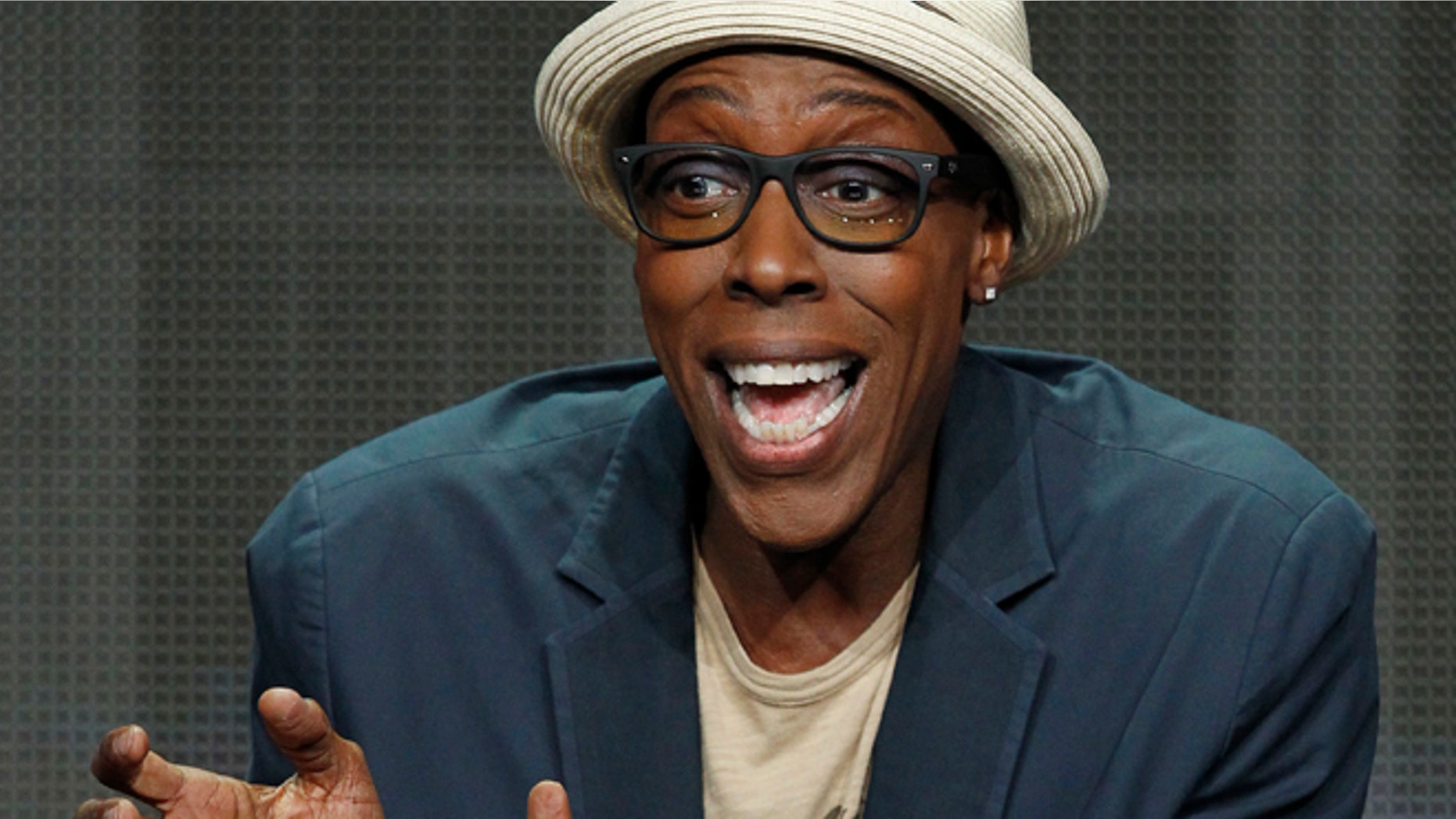 Host and executive producer Arsenio Hall speaks at a panel for the television series "The Arsenio Hall Show" during the CBS portion of the Television Critics Association Summer press tour in Beverly Hills, California July 29, 2013. REUTERS/Mario Anzuoni (UNITED STATES - Tags: ENTERTAINMENT) - RTX124AV