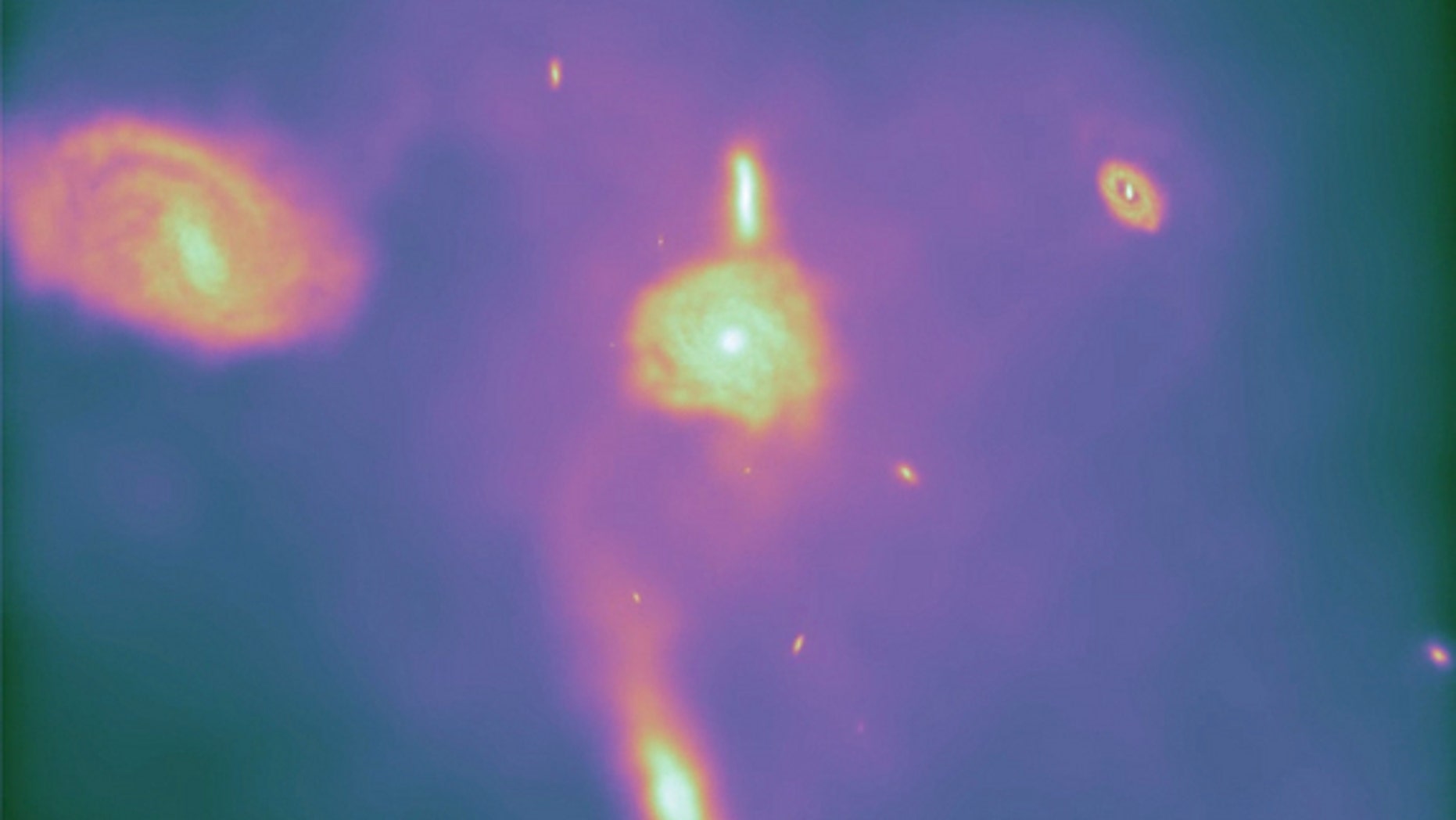 This still frame is taken from the Arepo-generated animation shown above. It demonstrates Arepo's key ability to produce realistic spiral galaxies. Previous simulations tended to yield blobby galaxies lacking distinct spiral structure. Posted A