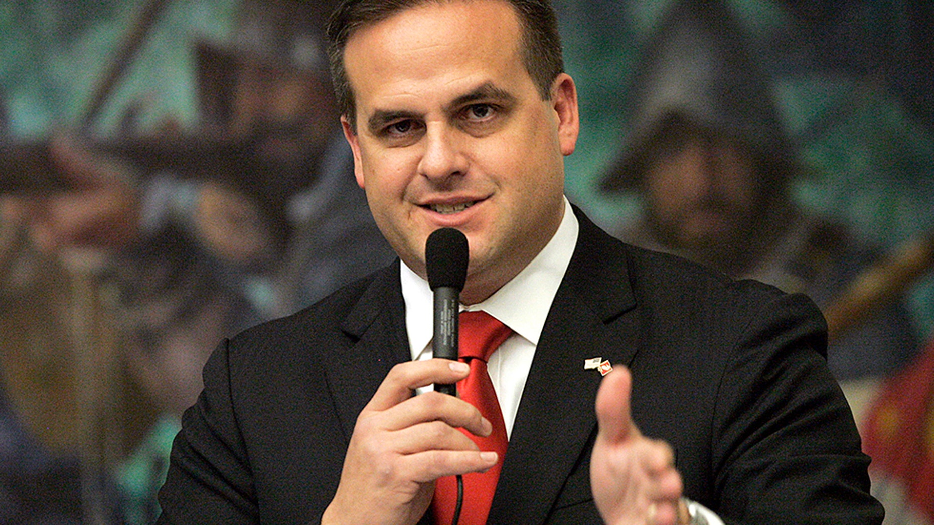 FILE - This March 9, 2012, file photo shows Republican state senator Frank Artiles, R-Miami, asking a questions about a pip insurance bill during house session in Tallahassee, Fla. Artiles, a Republican state senator, is expected to apologize publicly Wednesday April 19, 2017, for using racial slurs and obscene insults in a private after-hours conversation with African-American colleagues. (AP Photo/Steve Cannon, File)