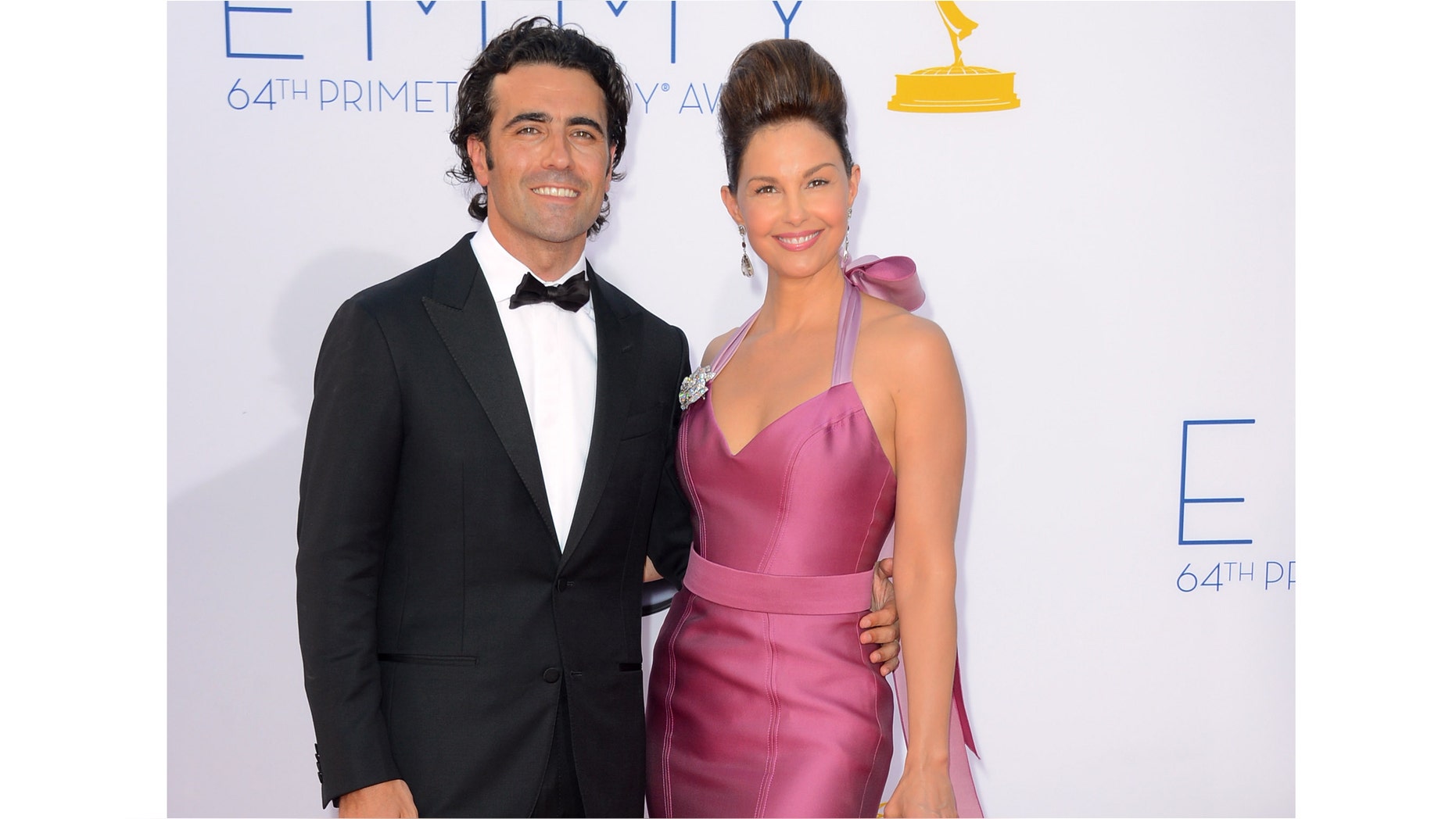 LOS ANGELES, CA - SEPTEMBER 23: Actress Ashley Judd (R) and guest arrive at the 64th Annual Primetime Emmy Awards at Nokia Theatre L.A. Live on September 23, 2012 in Los Angeles, California. (Photo by Frazer Harrison/Getty Images)
