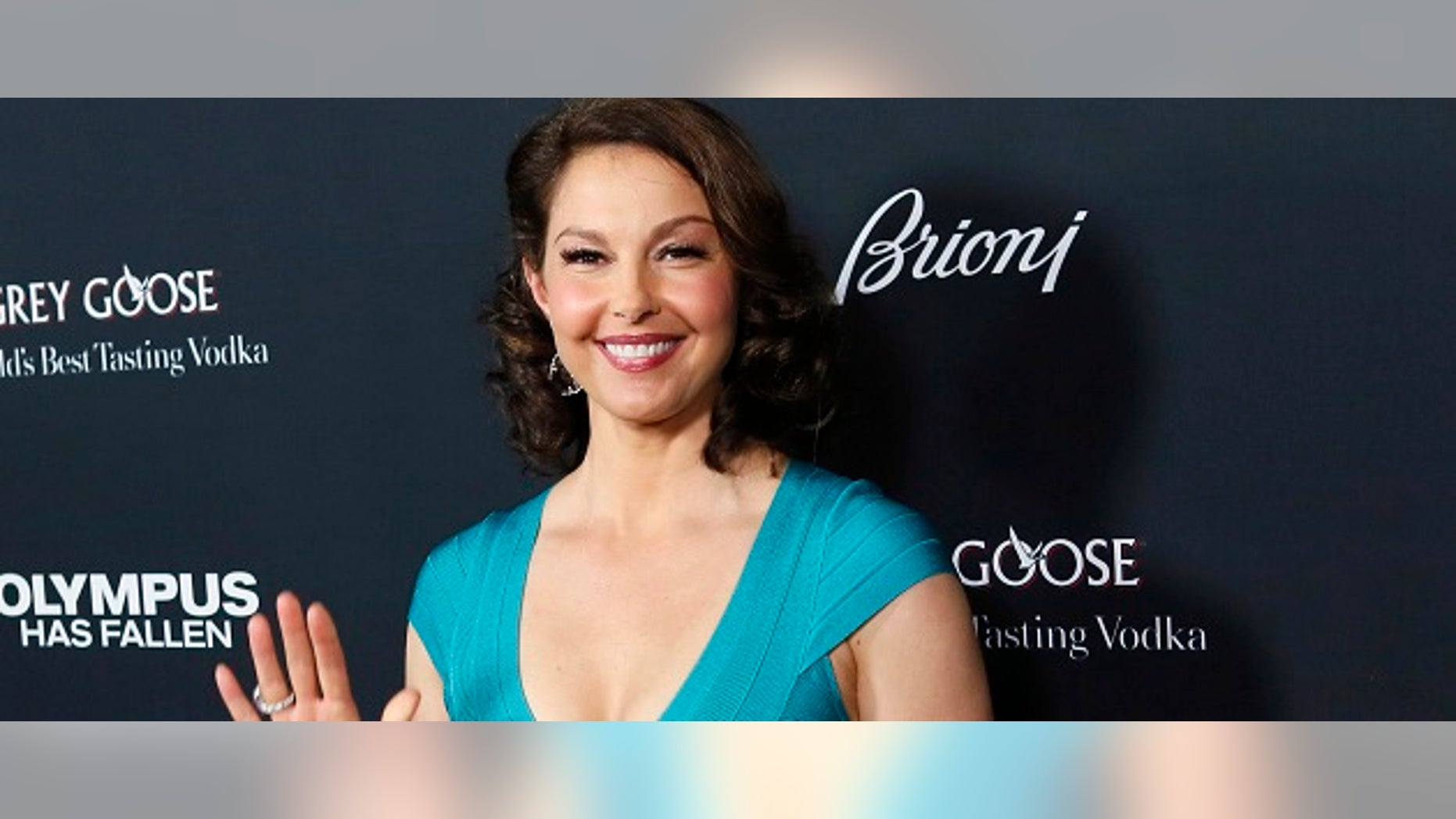Cast member Ashley Judd arrives at the premiere of the movie "Olympus Has Fallen" at the ArcLight Cinema in Hollywood, California March 18, 2013. REUTERS/Patrick Fallon (UNITED STATES - Tags: ENTERTAINMENT) - RTR3F6DH