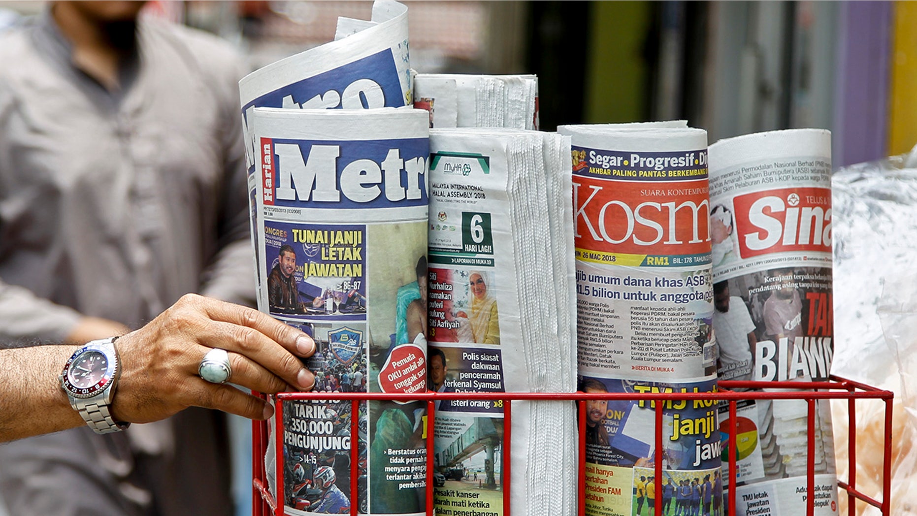 A Malaysian bill would give fake news peddlers a 10-year prison term.