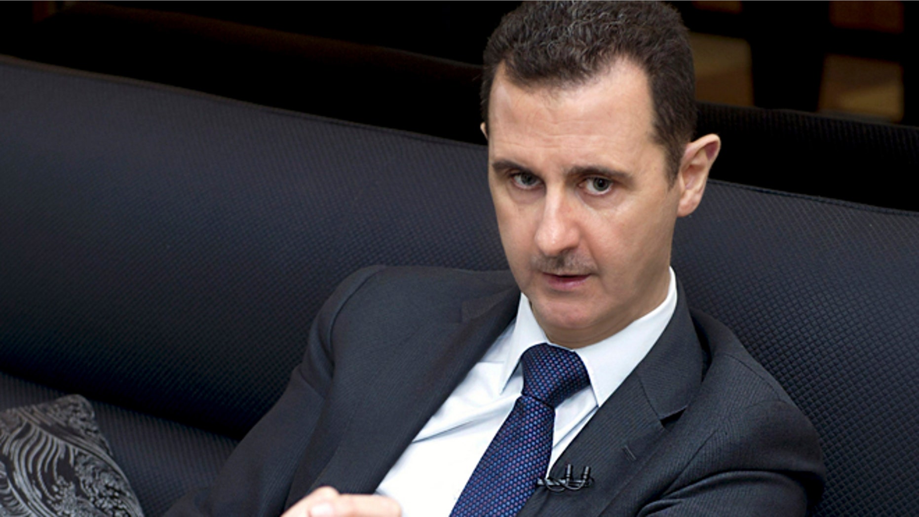 June 17, 2013: Syria's President Bashar al-Assad speaks during an interview with a German newspaper in Damascus, in this handout photograph distributed by Syria's national news agency SANA. (Reuters)