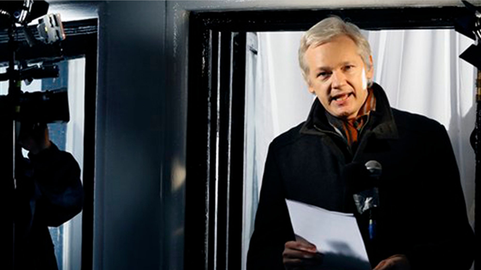 In this Thursday, Dec. 20, 2012, file photo, Julian Assange, founder of WikiLeaks speaks to the media and members of the public from a balcony at the Ecuadorian Embassy in London. (AP Photo/Kirsty Wigglesworth, File)