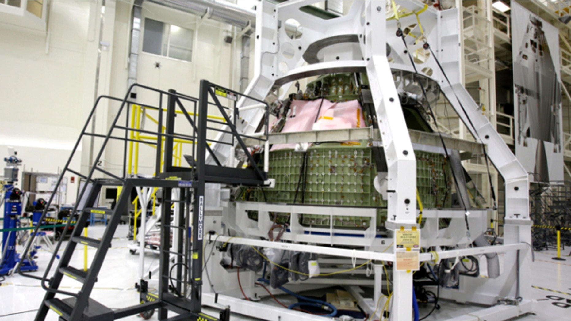 Jan. 13, 2013: The Orion Exploration Flight Test 1crew module is seen in the Operations and Checkout building during a media tour at the Kennedy Space Center in Cape Canaveral, Fla.