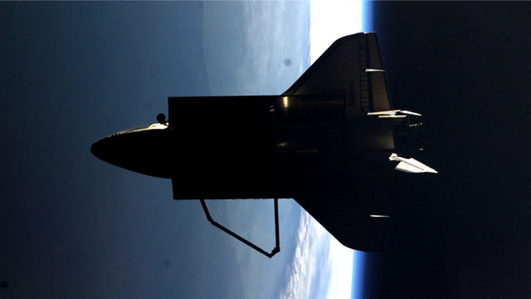Astronaut Ron Garan tweeted this picture from the International Space Station: "The view #FromSpace of Shuttle #Atlantis flyaround of #ISS today (7/19/11) from Sergei's bedroom window."