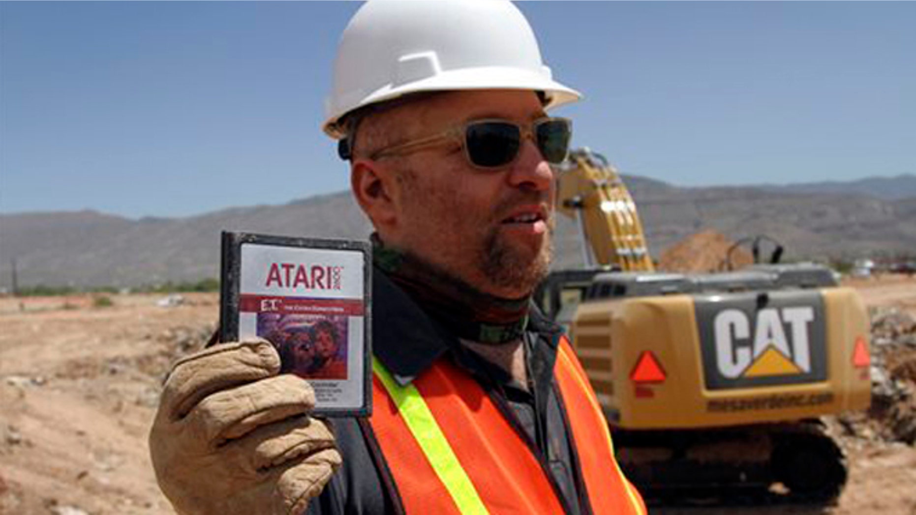 April 26, 2014: In this file photo, film director Zak Penn shows a box of a decades-old Atari "E.T. the Extra-Terrestrial" game found in a dumpsite in Alamogordo, N.M.