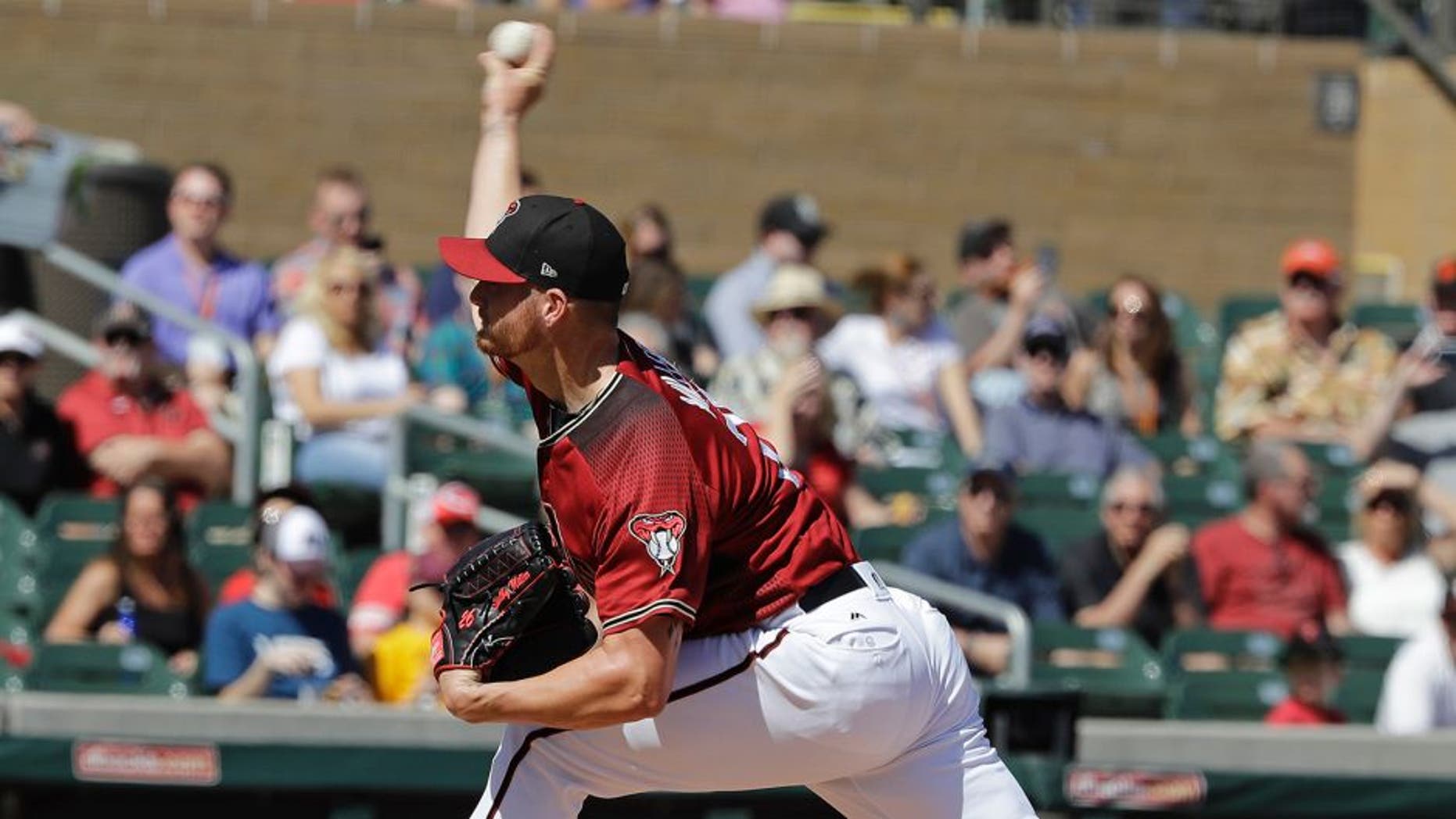 Arizona Diamondbacks' Shelby Miller throws during the first inning of a spring training baseball game against the Oakland Athletics, Tuesday, March 7, 2017, in Scottsdale, Ariz. (AP Photo/Darron Cummings)