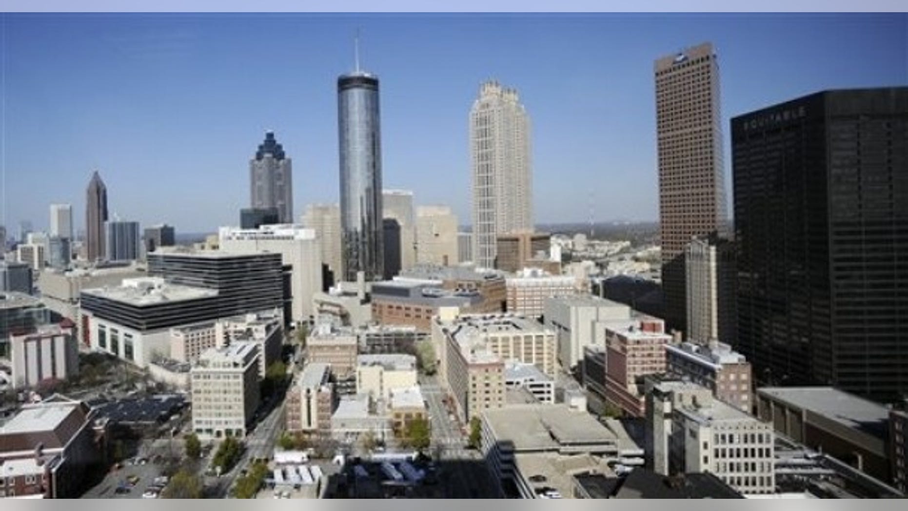 The Atlanta skyline is shown Thursday, March 17, 2011. According to census data released Thursday Atlanta's population slowed over the last 10 years with the city adding only 1 percent as people fled to the suburbs seeking better schools, cheaper homes and safer neighborhoods. (AP Photo/Mike Stewart)