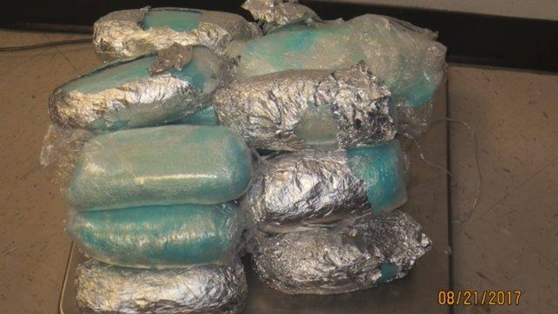 Bundles of meth seized from a woman who was trying to smuggle it from Mexico into El Paso.