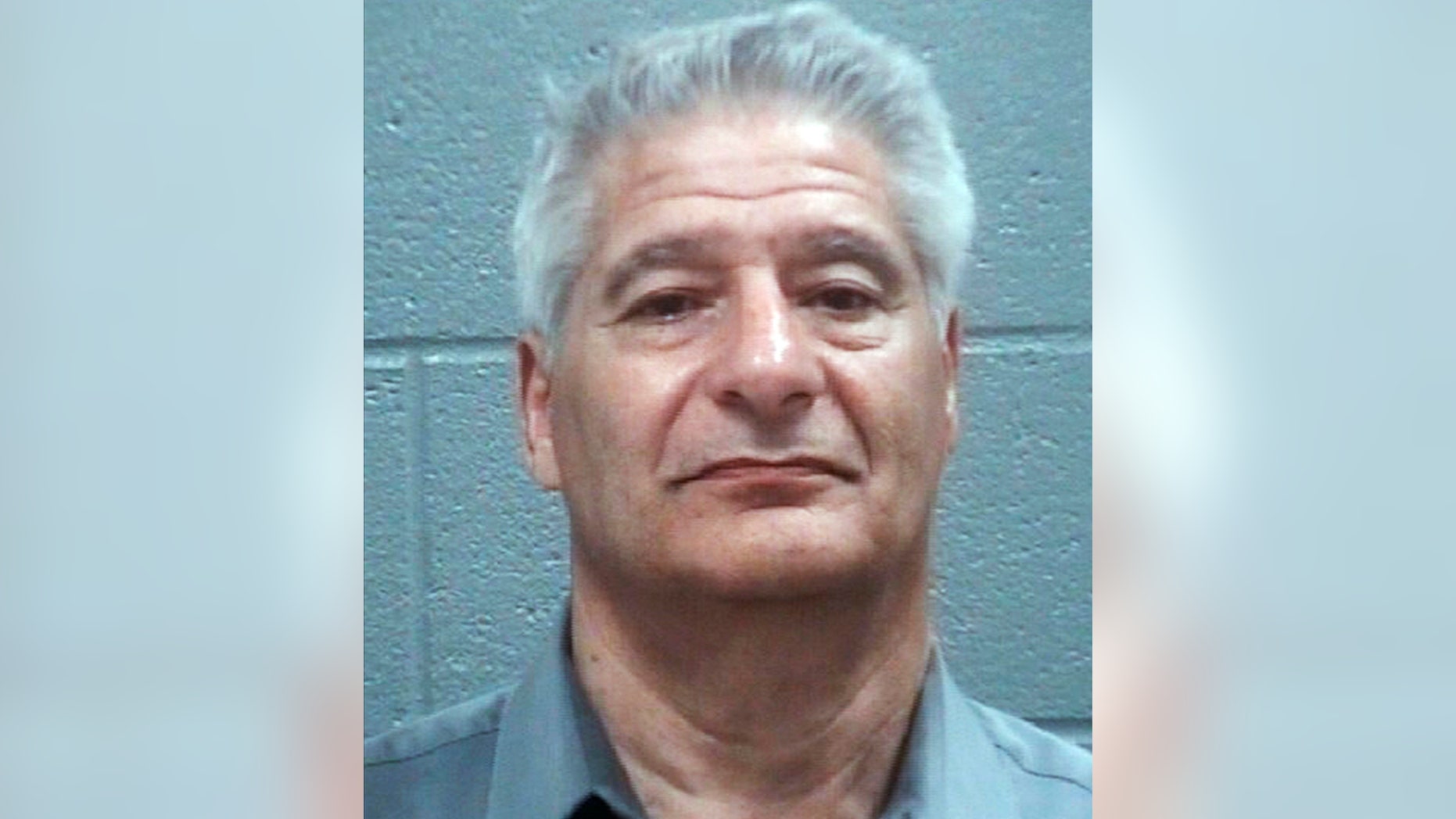 Steven F. Hoppenbrouwer was charged with driving under the influence after the charter bus he was driving to the Masters golf tournament overturned on a Georgia interstate Thursday, April 5, 2018, injuring passengers.