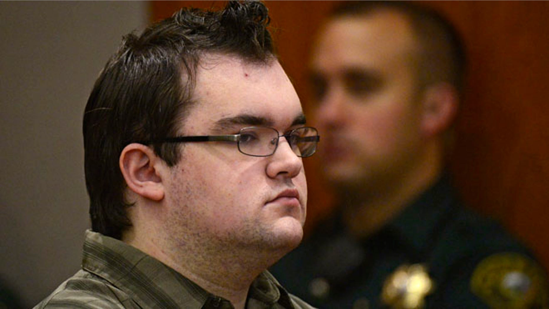 Nov.19, 2013: Austin Sigg sits in district court in Golden, Colo., on Tuesday, during the second day of his sentencing hearing. Sigg, 18, pleaded guilty last month to kidnapping and killing Jessica Ridgeway in Westminster in October 2012.