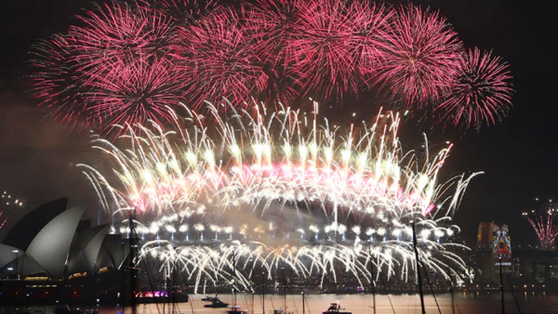 Jan. 1, 2016: Fireworks explode over the Opera House and Harbour Bridge during New Year's Eve fireworks display in Sydney, Australia. (AP)