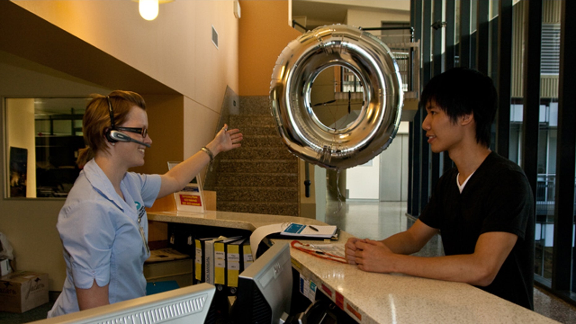 Bryan Huangs doughnut blimp helps guide visitors from reception to meeting rooms.