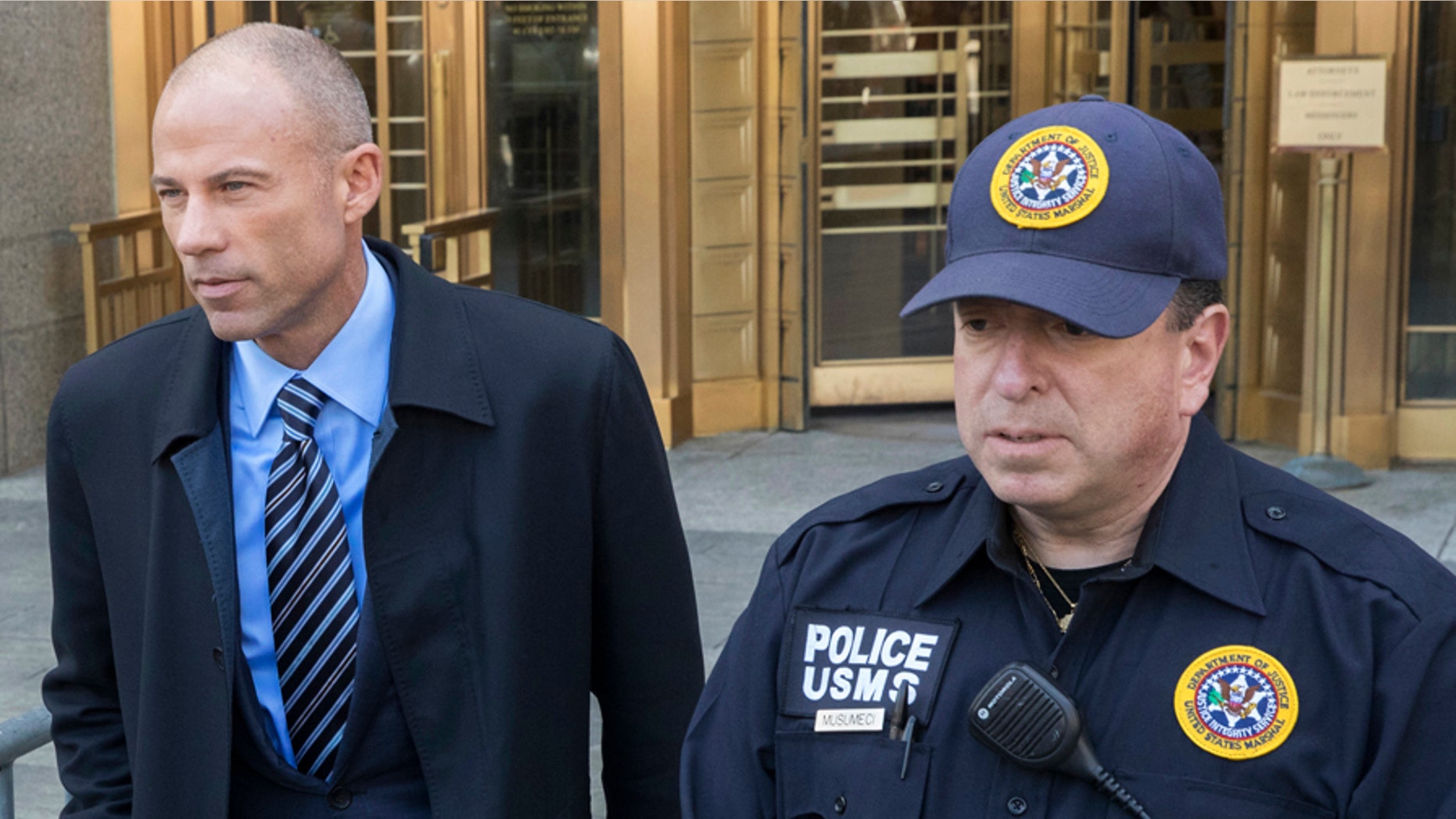 Michael Avenatti, left, Stormy Daniels' attorney, leaves federal court in New York after a hearing for Michael Cohen, President Donald Trump's personal attorney, Thursday, April 26, 2018.