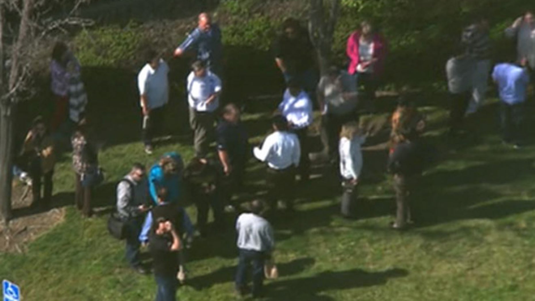 Emergency crews respond to reports of a suspicious package outside a federal building in Alameda, Calif.