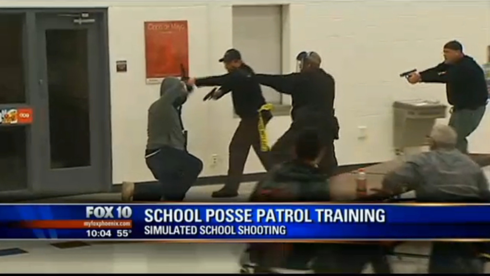 Members of the Maricopa County Sheriff's SWAT team stimulate a school shooting at a Phoenix-area school.