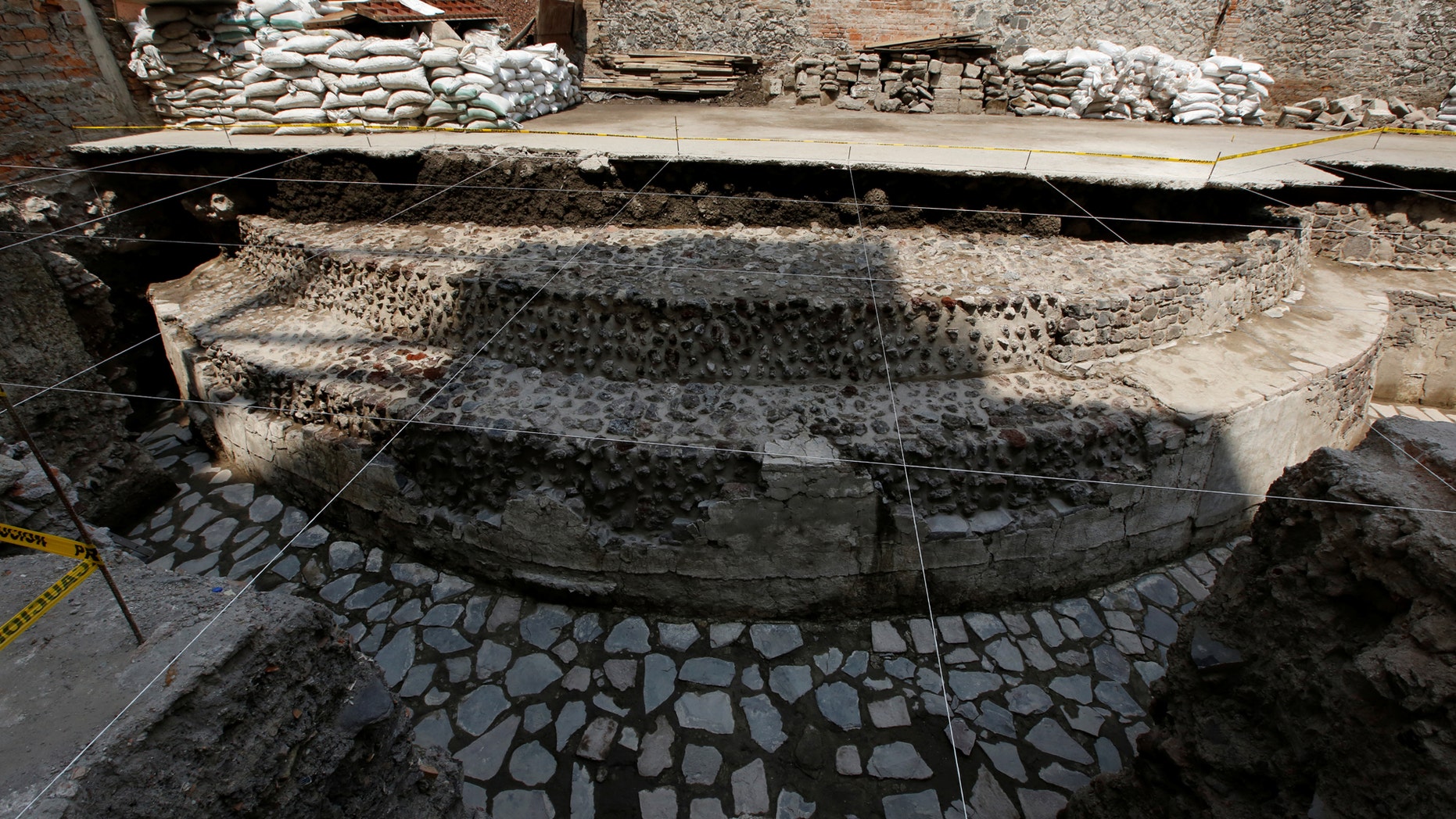 A new Aztec discovery of the remains of the main temple of the wind god Ehecatl, a major deity, is seen during a tour of the area, located just off the Zocalo plaza in the heart of downtown Mexico City, Mexico June 7, 2017. (REUTERS/Henry Romero)