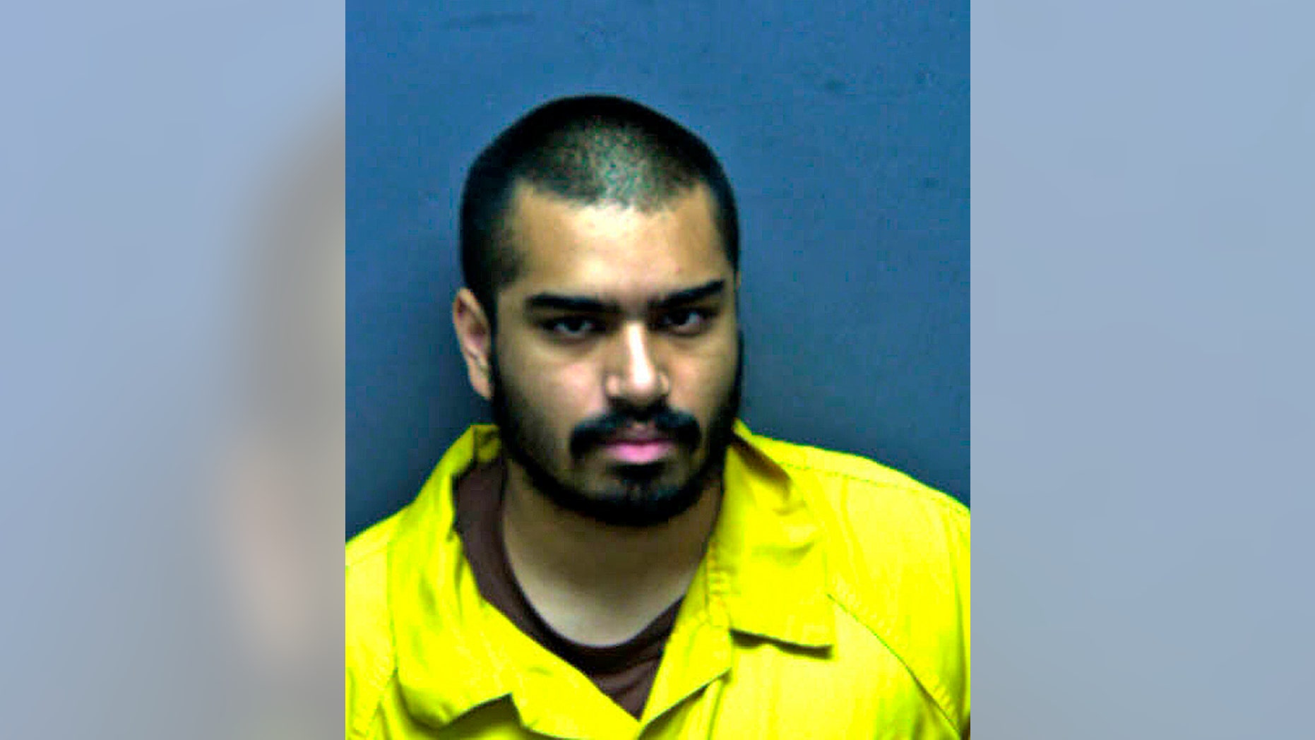 This undated booking photo released by the Western Virginia Regional Jail, shows Wasil Farooqui. The FBI is investigating a stabbing in Virginia in which Farooqui allegedly shouted "Allahu akbar" while attacking a man and woman. The 20-year-old Farooqui is charged with two counts of aggravated malicious wounding and is being held without bond at the Western Virginia Regional Jail. Online court records did not list an attorney. (Western Virginia Regional Jail via AP)