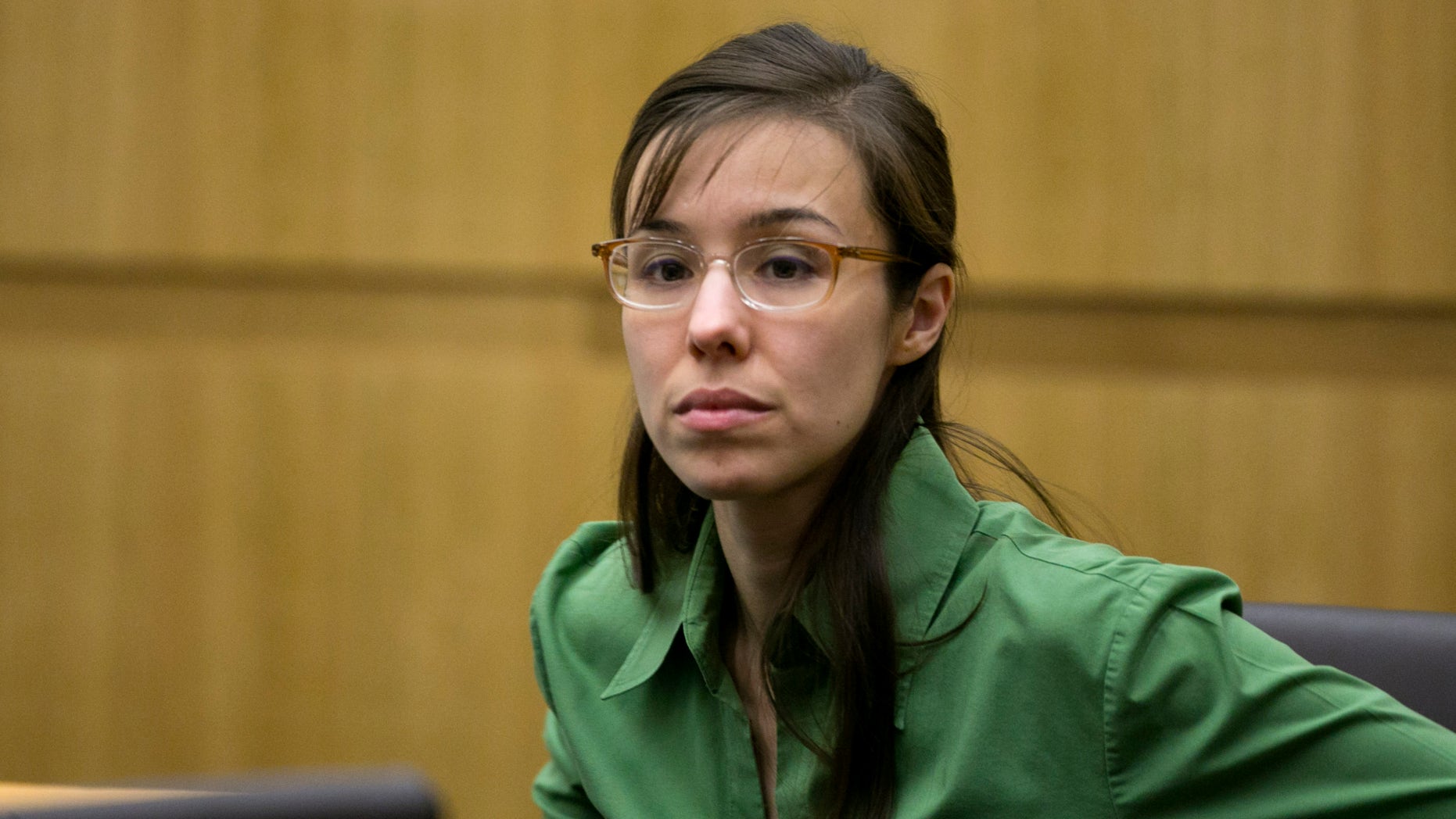Defendant Jodi Arias looks at the jury as they enter the courtroom during her trial at Maricopa County Superior Court in Phoenix on Wednesday, April 17, 2013. Arias is on trial for the killing of her boyfriend, Travis Alexander in 2008. Arias claims self-defense but faces a potential death sentence if convicted of first-degree murder. (AP Photo/The Arizona Republic, David Wallace, Pool)