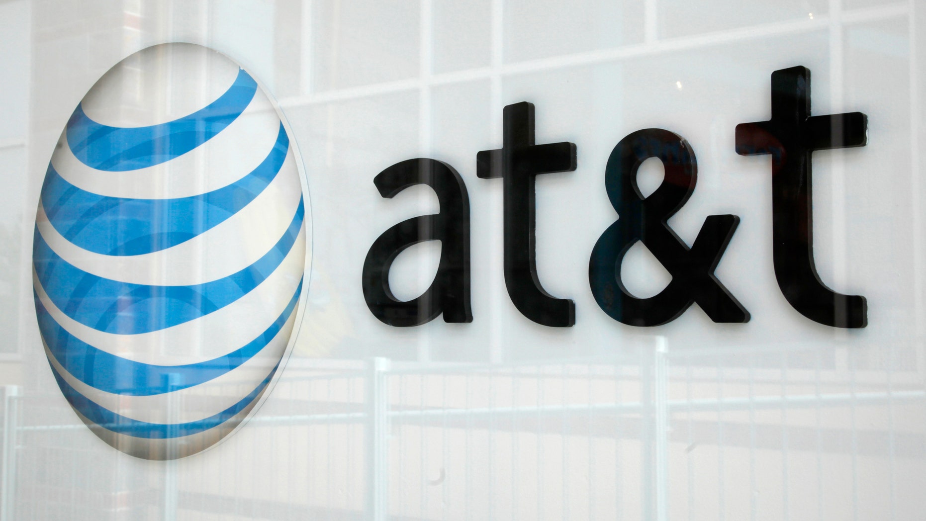 File photo: A view shows the AT&T store sign in Broomfield, Colorado April 20, 2011. (REUTERS/Rick Wilking)