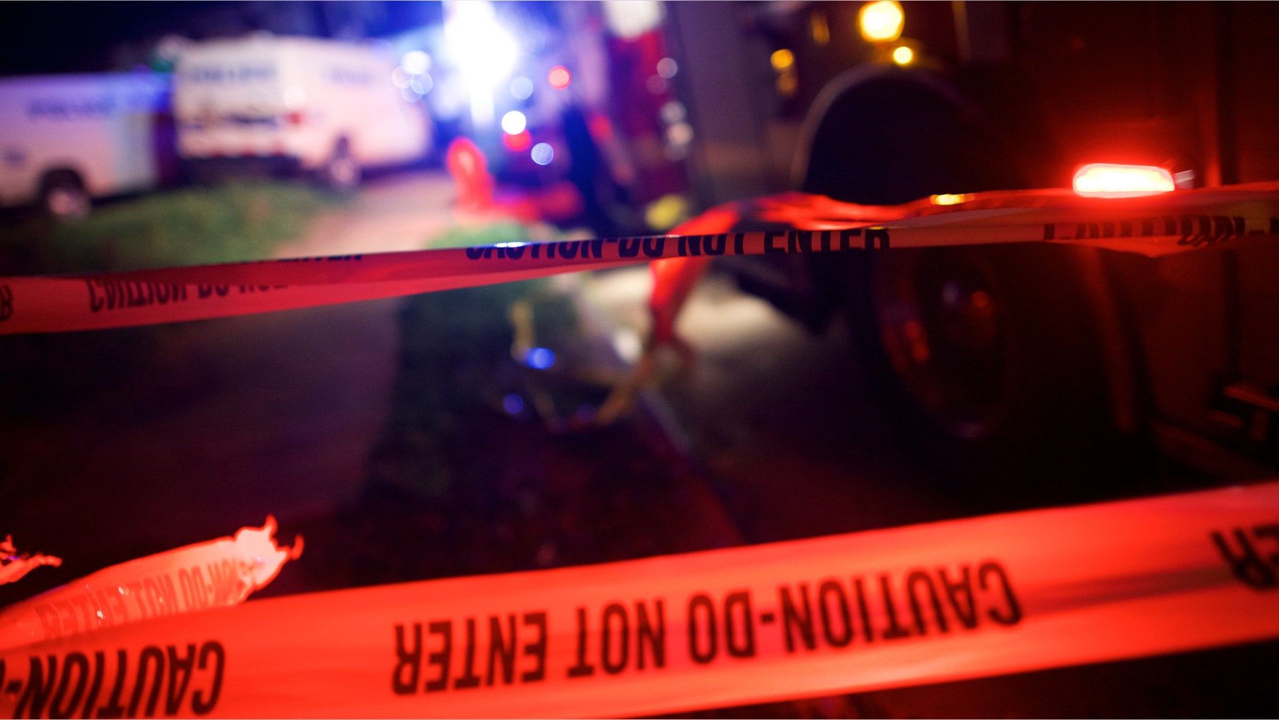 PHILADELPHIA, PA - MAY 12: Police tape blocks the area near the wreckage of an Amtrak passenger train carrying more than 200 passengers from Washington, DC to New York that derailed May 12, 2015 in north Philadelphia, Pennsylvania. At least five people were killed and more than 50 others were injured in the crash. (Photo by Mark Makela/Getty Images)