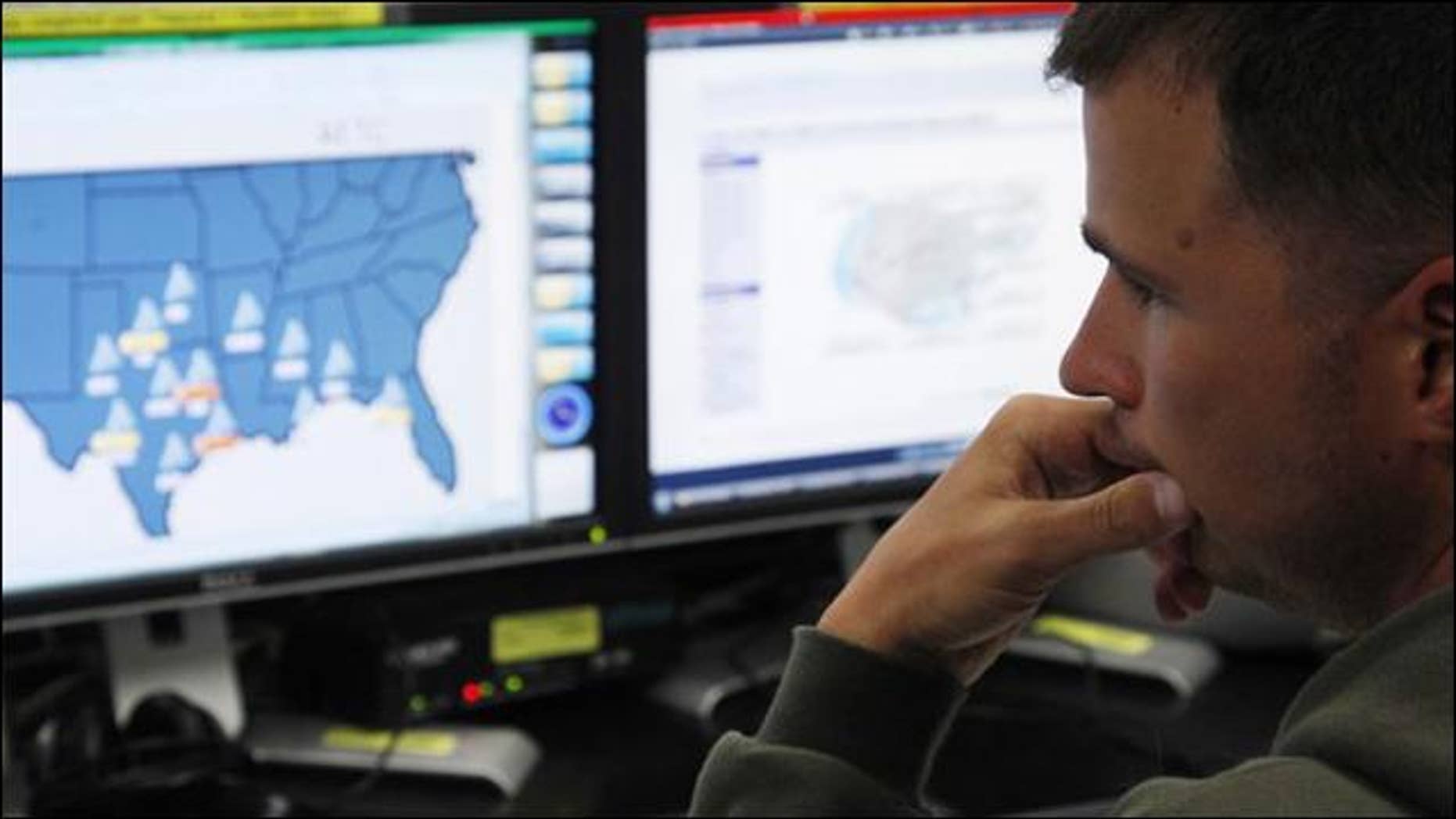 July 20, 2010: Josh Mayeux, network defender, works at the Air Force Space Command Network Operations & Security Center at Peterson Air Force Base in Colorado Springs, Colorado.