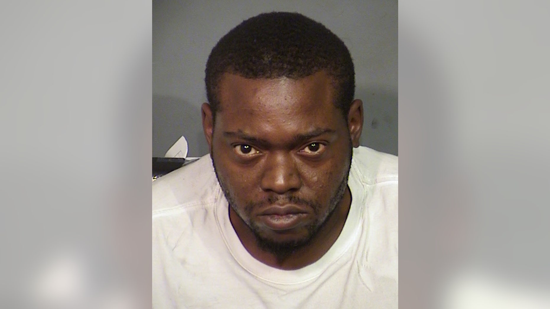 This Saturday, Oct. 15, 2016 photo provided by the Las Vegas Metro Police Department shows Kenneth McDonald, who is facing several charges including murder. Las Vegas police said he was randomly shooting at cars on the freeway when he killed a woman. (Las Vegas Metro Police Department via AP)