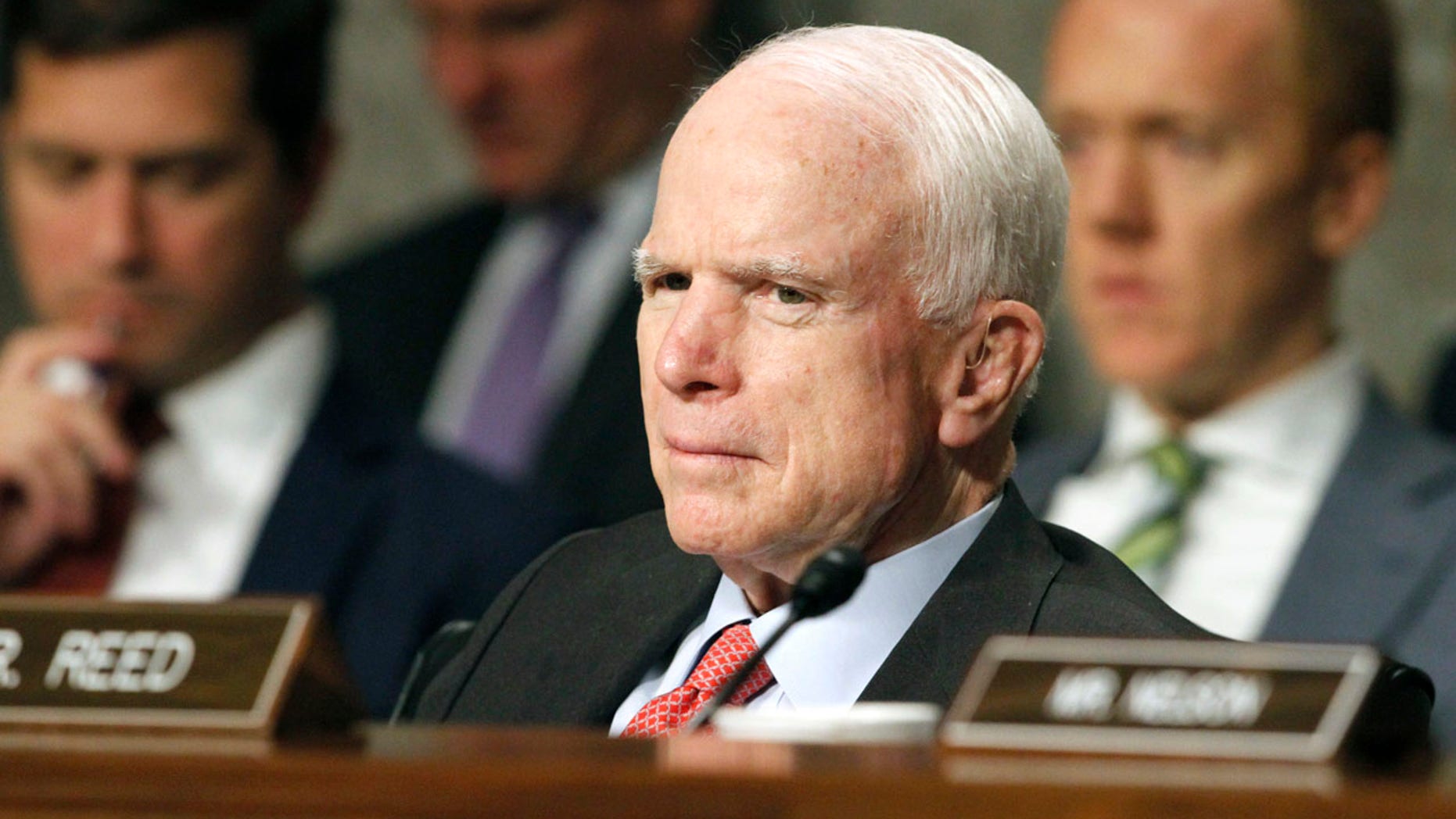 FILE - In this July 11, 2017 file photo, Senate Armed Services Committee Chairman Sen. John McCain, R-Ariz. listens on Capitol Hill in Washington, during the committee's confirmation hearing for Nay Secretary nominee Richard Spencer. Surgeons in Phoenix said they removed a blood clot from above the left eye of McCain. Mayo Clinic Hospital doctors said Saturday, July 15 that McCain underwent a "minimally invasive" procedure to remove the nearly 2-inch (5-centimeter) clot, and that the surgery went "very well." They said the 80-year-old Republican is resting comfortably at his home in Arizona. Pathology reports are expected in the next several days. (AP Photo/Jacquelyn Martin, File)