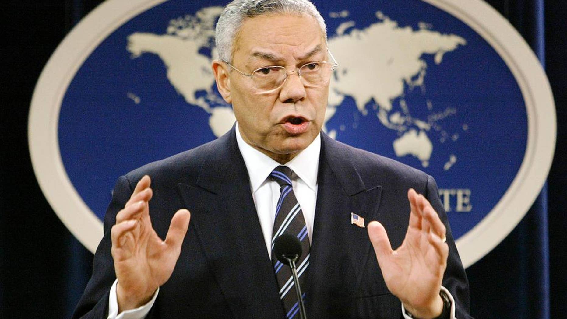FILE - In this Jan. 8, 2004, file photo, then-Secretary of State Colin Powell speaks at a news conference in Washington at the State Department. A document circulating among White House staff says a Senate report on the CIA's interrogation and detention practices after the 9/11 attacks concludes that the agency initially kept Powell and some U.S. ambassadors in the dark about harsh techniques and secret prisons. (AP Photo/J. Scott Applewhite, File)