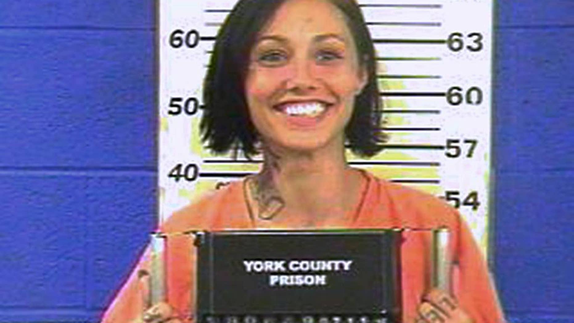 This undated photo provided by the York County Prison shows Jessica Reger. Law enforcement officials accuse Reger of stuffing her children, ages 3 and 5, into the trunk of a red Corvette pulled over Sunday, July 10, 2016, by Hanover Borough Police in Hanover, Pa. Authorities say Reger was riding as the passenger in the two-seater sports car, and faces two misdemeanor charges of endangering the welfare of children and recklessly endangering another person. Authorities say the driver, Ilena Blackburn, is charged with recklessly endangering another person. (York County Prison via AP)