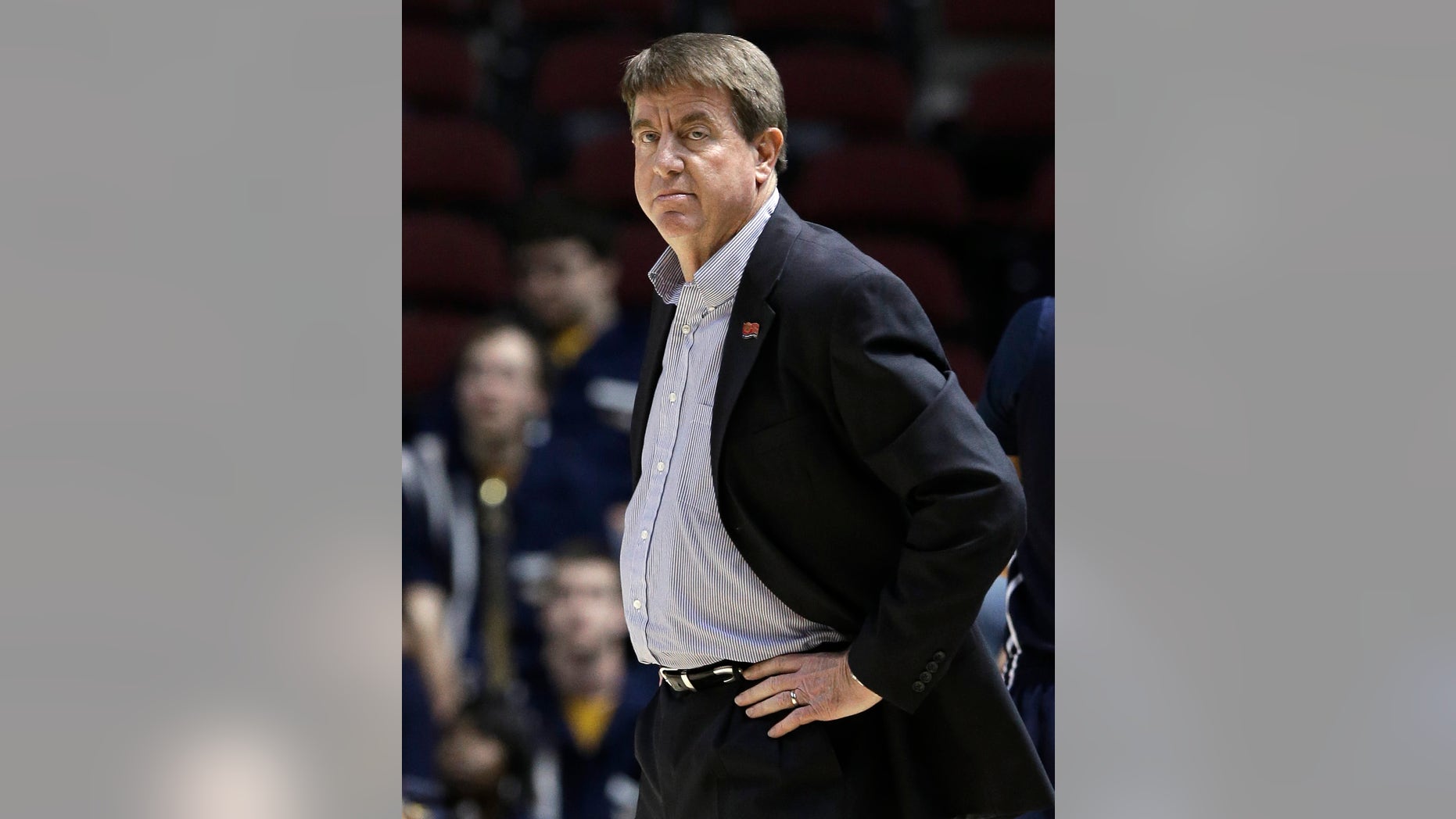 FILE - In this March 23, 2013, file photo, Chattanooga coach Wes Moore watches his team's first-round game against Nebraska in the NCAA women's college basketball tournament in College Station, Texas. North Carolina State announced Friday, April 5, 2013, that Moore will take over its women's basketball program, which has reached the NCAA tournament just once in six years and hasn't had a winning record in Atlantic Coast Conference play in that span. (AP Photo/Pat Sullivan, File)