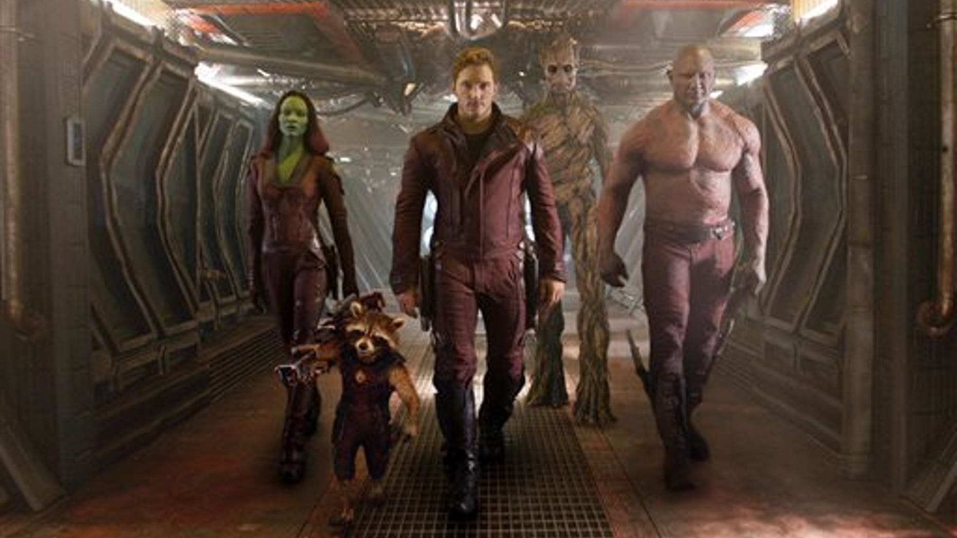 This image released by Disney - Marvel shows, from left, Zoe Saldana, the character Rocket Racoon, voiced by Bradley Cooper, Chris Pratt, the character Groot, voiced by Vin Diesel, and Dave Bautista in a scene from "Guardians of the Galaxy." The movie releases on Friday, Aug. 1, 2014. (AP Photo/Disney - Marvel)