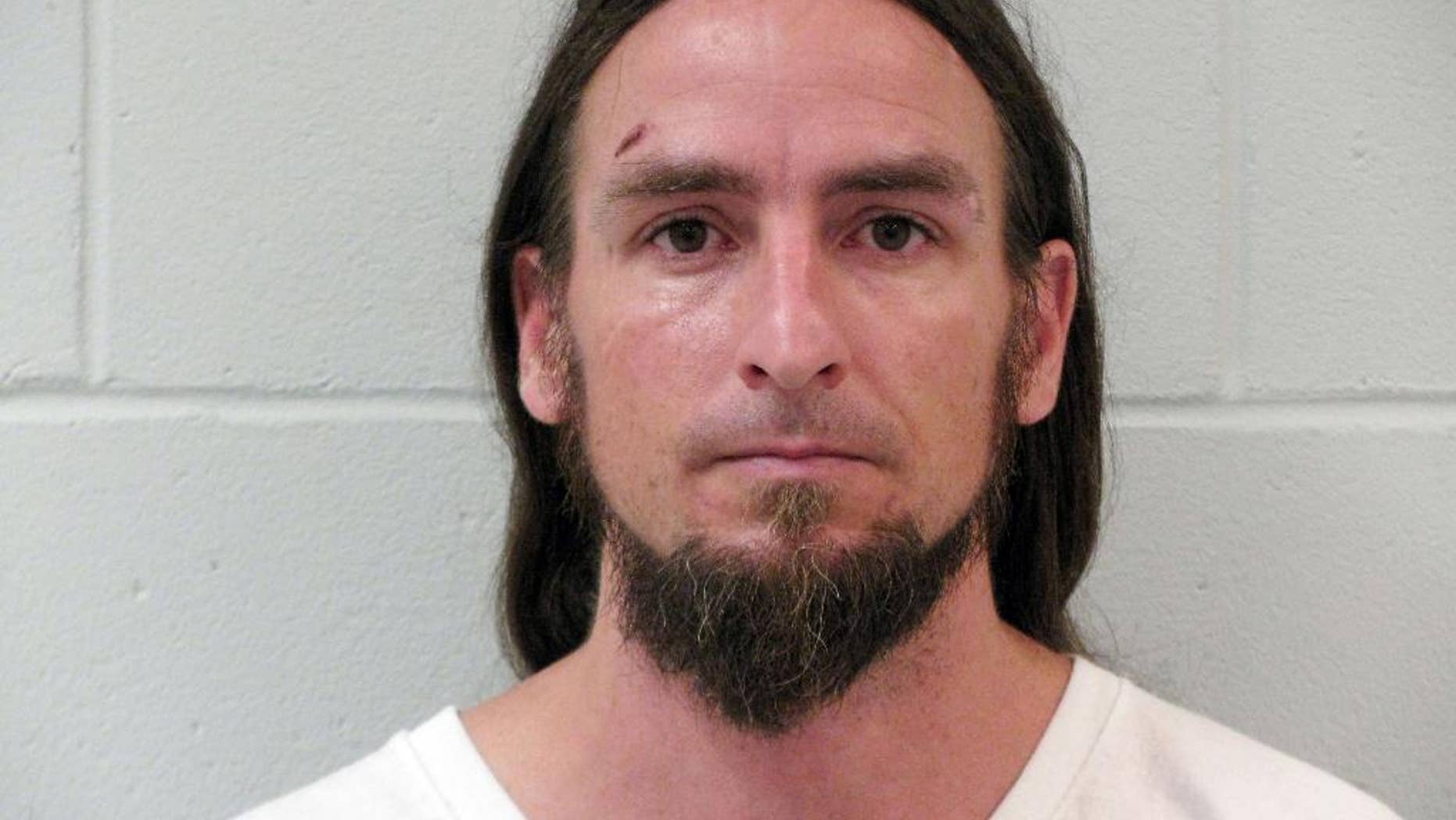 Huckleberry Finn is shown in a photo provided by the Keene, N.H. Police Department. Keene police say a man named Huckleberry Finn followed a woman into her home on July 25 and sexually assaulted her. Keene police stressed that the 36-year-old man’s real name is the same as the fictional protagonist in Mark Twain’s “Adventures of Huckleberry Finn.” He was arrested Wednesday, July 29, and was being held on $25,000 bail. (Keene, N.H. Police Department via AP)