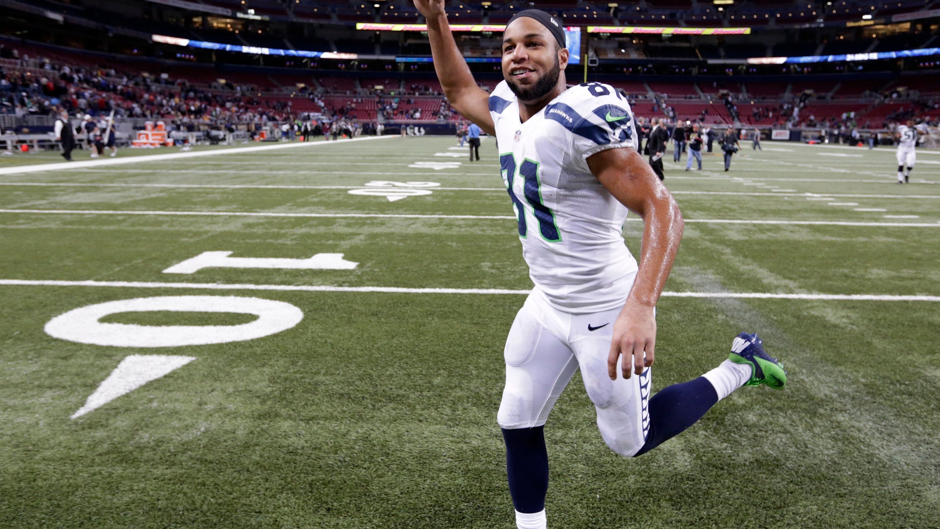 Seattle Seahawks wide receiver Golden Tate (81) celebrates after an NFL football game against the St. Louis Rams, Monday, Oct. 28, 2013, in St. Louis. The Seahawks won 14-9. (AP Photo/Michael Conroy)