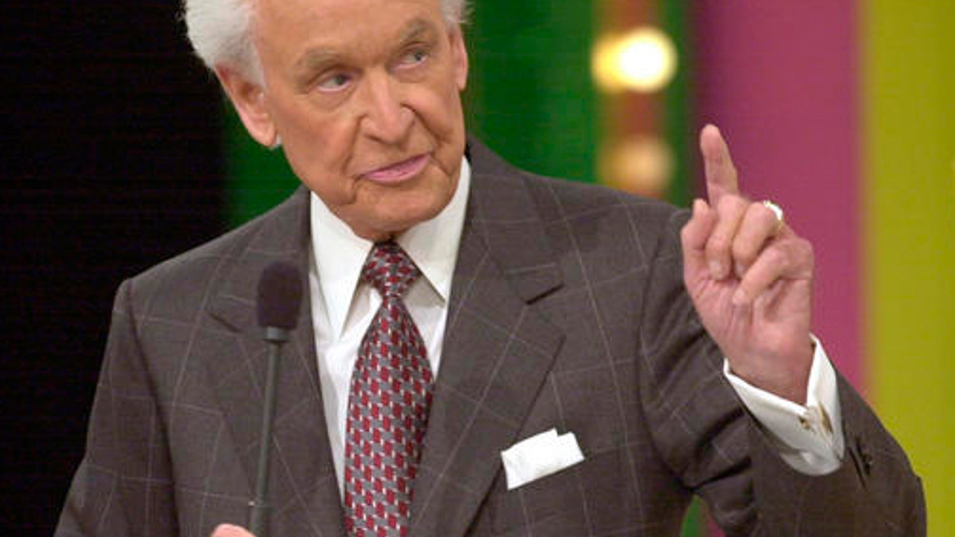 **FILE**Bob Barker, 79, host of game show "The Price is Right," gestures during taping of a show on, Jan. 15, 2003, in Los Angeles. Barker has agreed to continue as host of "The Price Is Right" for a record 34th season, CBS announced Monday, Jan. 3, 2005.(AP Photo/Nick Ut)