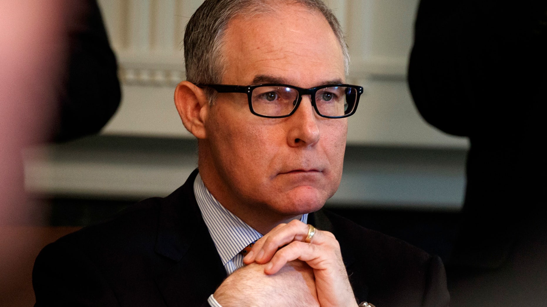 EPA administrator Scott Pruitt listens as President Trump speaks during a cabinet meeting at the White House.