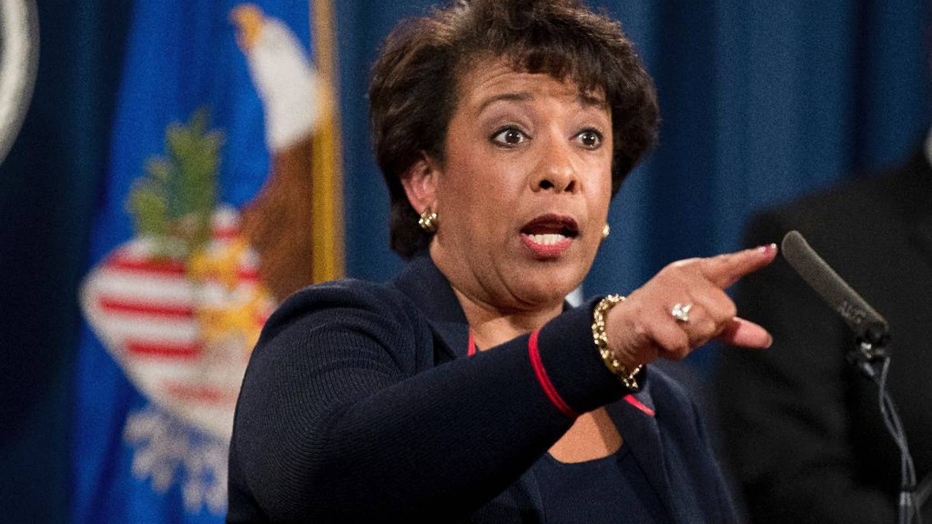 FILE - In this Sept. 22, 2016, file photo Attorney General Loretta Lynch takes a question during a news conference at the Justice Department in Washington. Hate crimes tear at the fabric of American communities and represent a stain on the country’s soul, Lynch said at a mosque and Muslim community center on Dec. 12. Lynch spoke at the All Dulles Area Muslim Society Center as law enforcement across the country confronts a spike in hate crimes targeting Muslims. (AP Photo/Andrew Harnik, File)