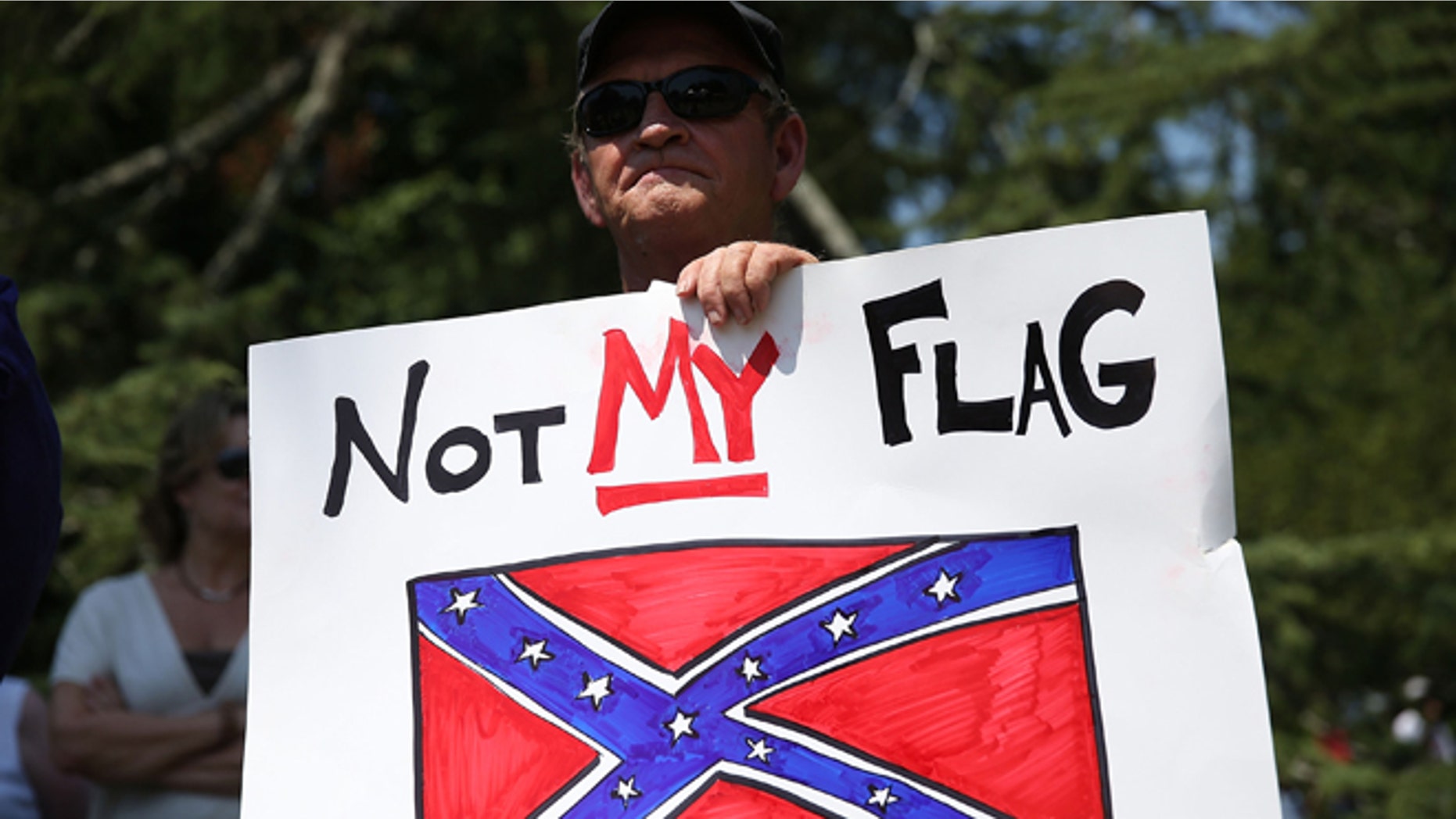 COLUMBIA, SC - JUNE 23: John Calef attends a protest in support of a Confederate flags removal from the South Carolina capitol grounds on June 23, 2015 in Columbia, South Carolina. The South Carolina governor Nikki Haley asked that the flag be removed after debate over the flag flying on the capitol grounds was kicked off after nine people were shot and killed during a prayer meeting at the Emanuel African Methodist Episcopal Church in Charleston, South Carolina. (Photo by Joe Raedle/Getty Images)