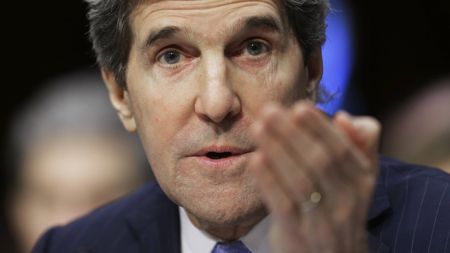 Senate Foreign Relations Chairman Sen. John Kerry, D-Mass., gestures during his confirmation hearing to become the next top diplomat, replacing Secretary of State Hillary Rodham Clinton, Thursday, Jan. 24, 2013, on Capitol Hill in Washington. Kerry is likely to face friendly questioning on a smooth path to approval before the committee he has served on for 28 years and led for the past four. (AP Photo/Pablo Martinez Monsivais)