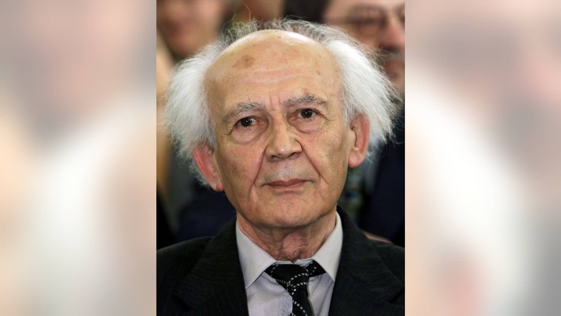 Polish sociologist Zygmunt Bauman, attends a ceremony in Frankfurt, Germany, Sunday, Sept. 13, 1998, where he received the Theodor W. Adorno-Prize. Bauman, one of the most prominent and prolific European sociologists of recent decades, has died at the age of 91. (AP Photo/Heribert Proepper)