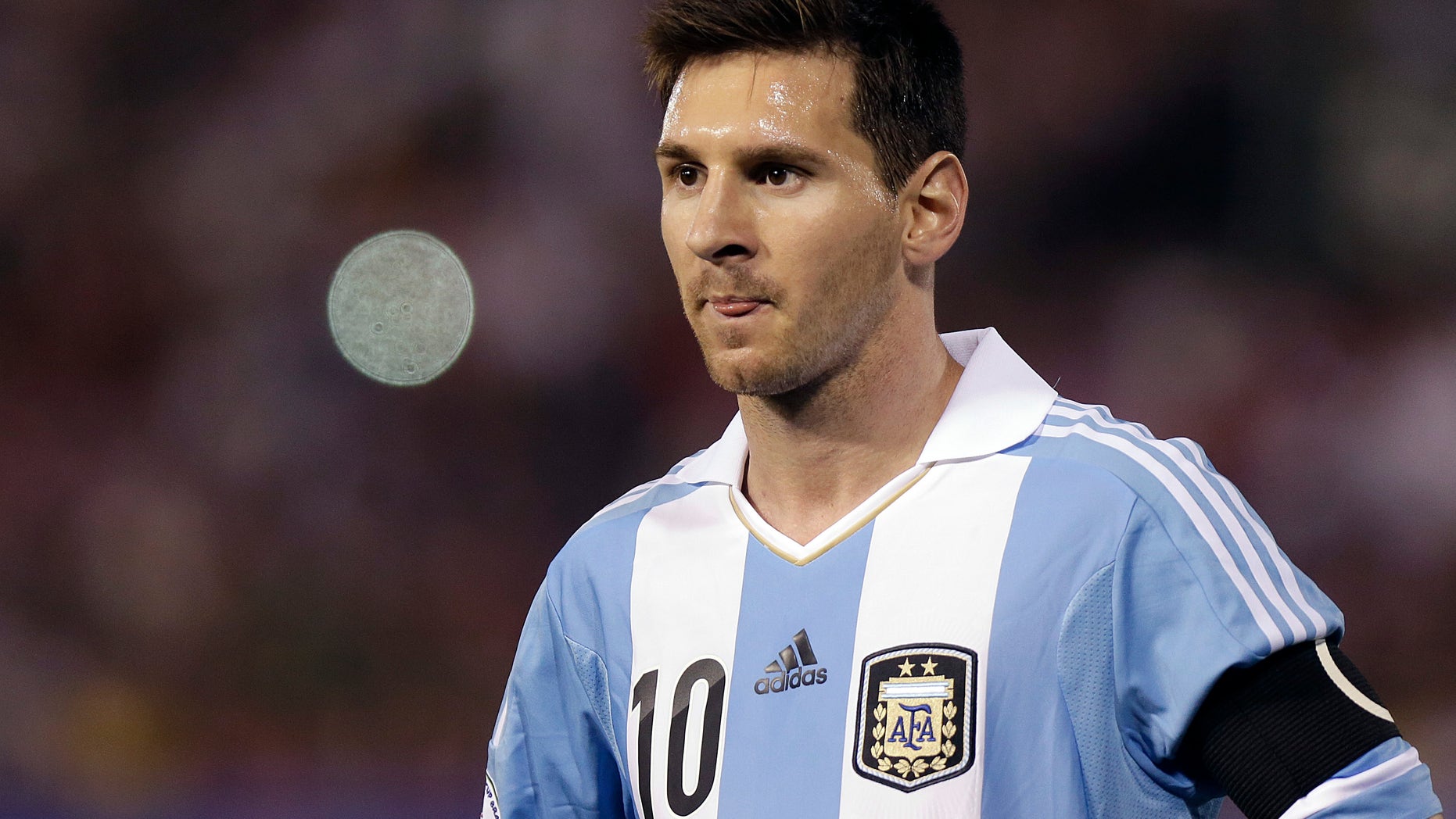 FILE - The Sept. 10, 2013 file photo shows Argentina's Lionel Messi on during a 2014 World Cup qualifying soccer game against Paraguay in Asuncion, Paraguay. Messi is one of the three candidates as the world's best soccer player to be awarded at the FIFA Ballon d'Or gala on Monday, Jan 13, 2014. (AP Photo/Andre Penner, file)