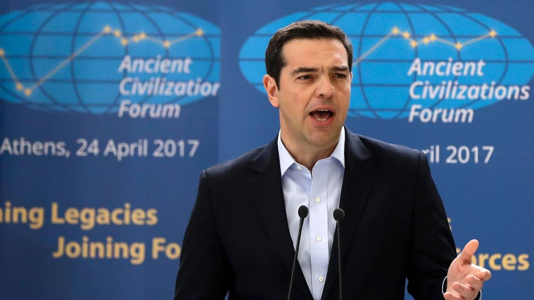 Greek Prime Minister Alexis Tsipras delivers a speech during the "Ancient Civilizations Forum" (ACForum) at Zappeio Conference Hall in Athens, Monday, April 24, 2017. Foreign Ministers and top officials from various countries attended the forum being held in the Greek capital. (AP Photo/Thanassis Stavrakis)