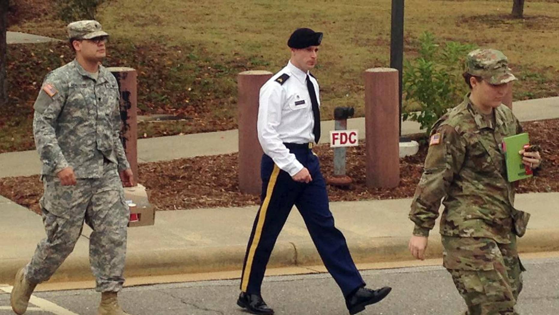 Army Sgt. Bowe Bergdahl is seen leaving a courtroom after a pretrial hearing in Fort Bragg, NC., Monday, Nov. 14, 2016. Bergdahl faces a military trial in 2017 on charges of desertion and misbehavior before the enemy after walking off his post in Afghanistan in 2009. (AP Photo/Jonathan Drew)