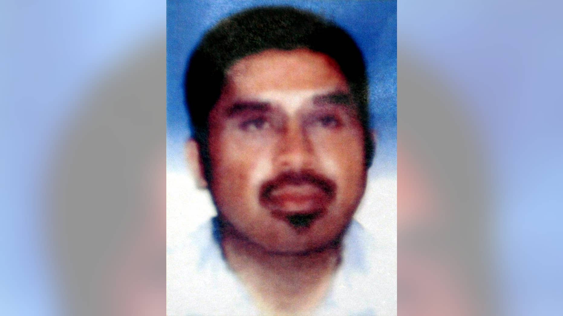 In this photo released by Indonesian National Police on Aug. 21, 2003, Southeast Asian terror mastermind Hambali is shown. Encep Nurjaman, who's known as Hambali, an Indonesian held for nearly 10 years at the U.S. military prison at Guantanamo Bay, Cuba, has appeared for the first time at a hearing called to determine whether he should remain in detention. (Indonesian National Police via AP)