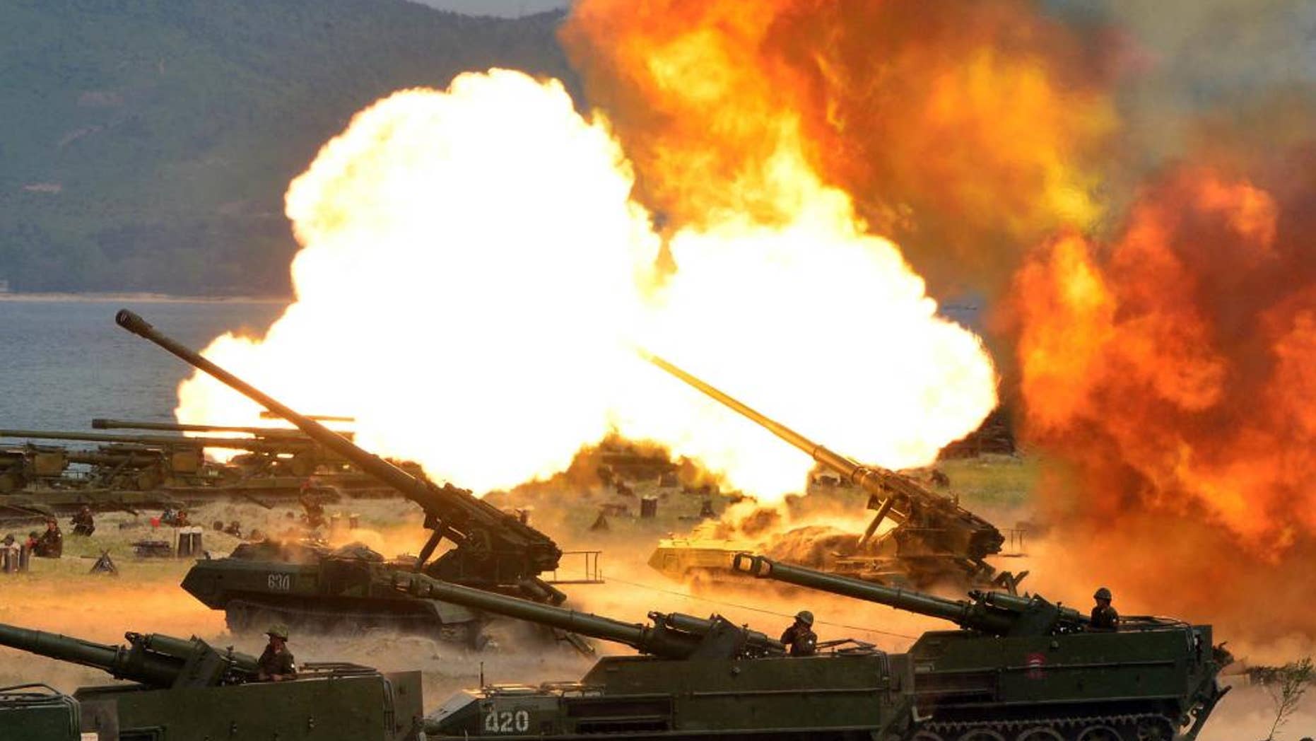 This photo distributed on Wednesday, April 26, 2017, by the North Korean government, shows what was said to be a "Combined Fire Demonstration" held to celebrate the 85th anniversary of the North Korean army, in North Korea. Independent journalists were not given access to cover the event depicted in this image distributed by the Korean Central News Agency via Korea News Service. (Korean Central News Agency/Korea News Service via AP)