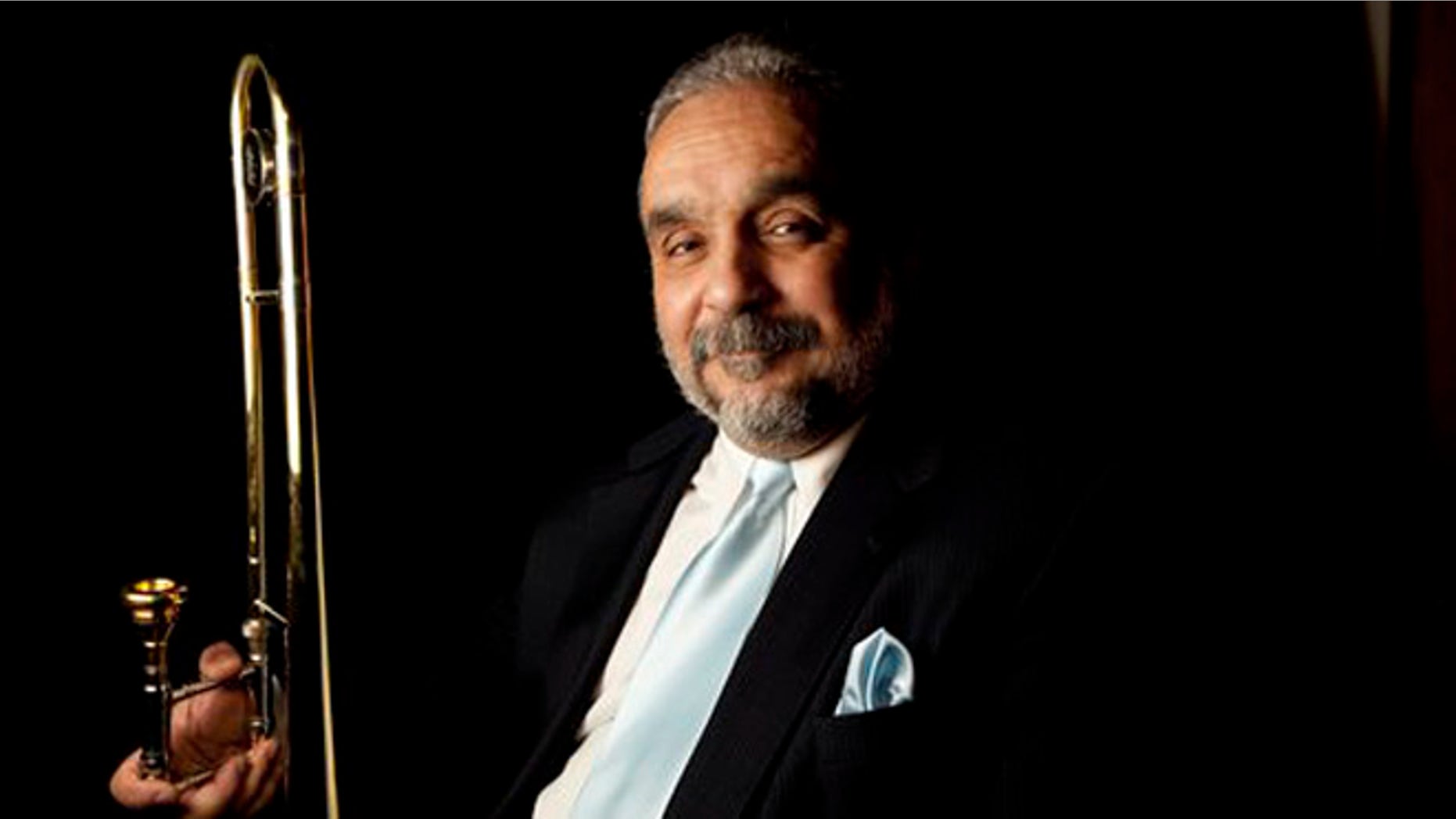 FILE - In this March 5, 2009 file photo, salsa musician Willie Colon poses for a portrait in Mexico City. Fania Records, Colon's label, is celebrating 50 years. It was founded in New York in 1964 by lawyer Jerry Masucci and band leader Johnny Pacheco, and promoted new Hispanic talents and focused on the quality of the music, not record sales. (AP Photo/Gregory Bull, File)