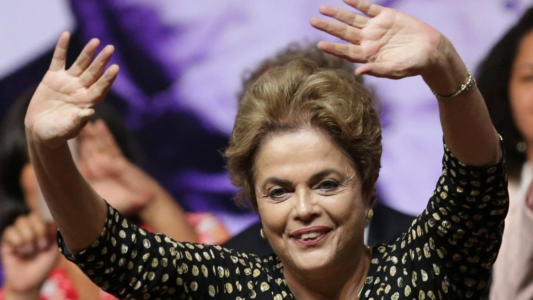 May 10, 2016: Brazil's President Dilma Rousseff waves to the crowd during the opening of the National Conference of Women, in Brasilia.