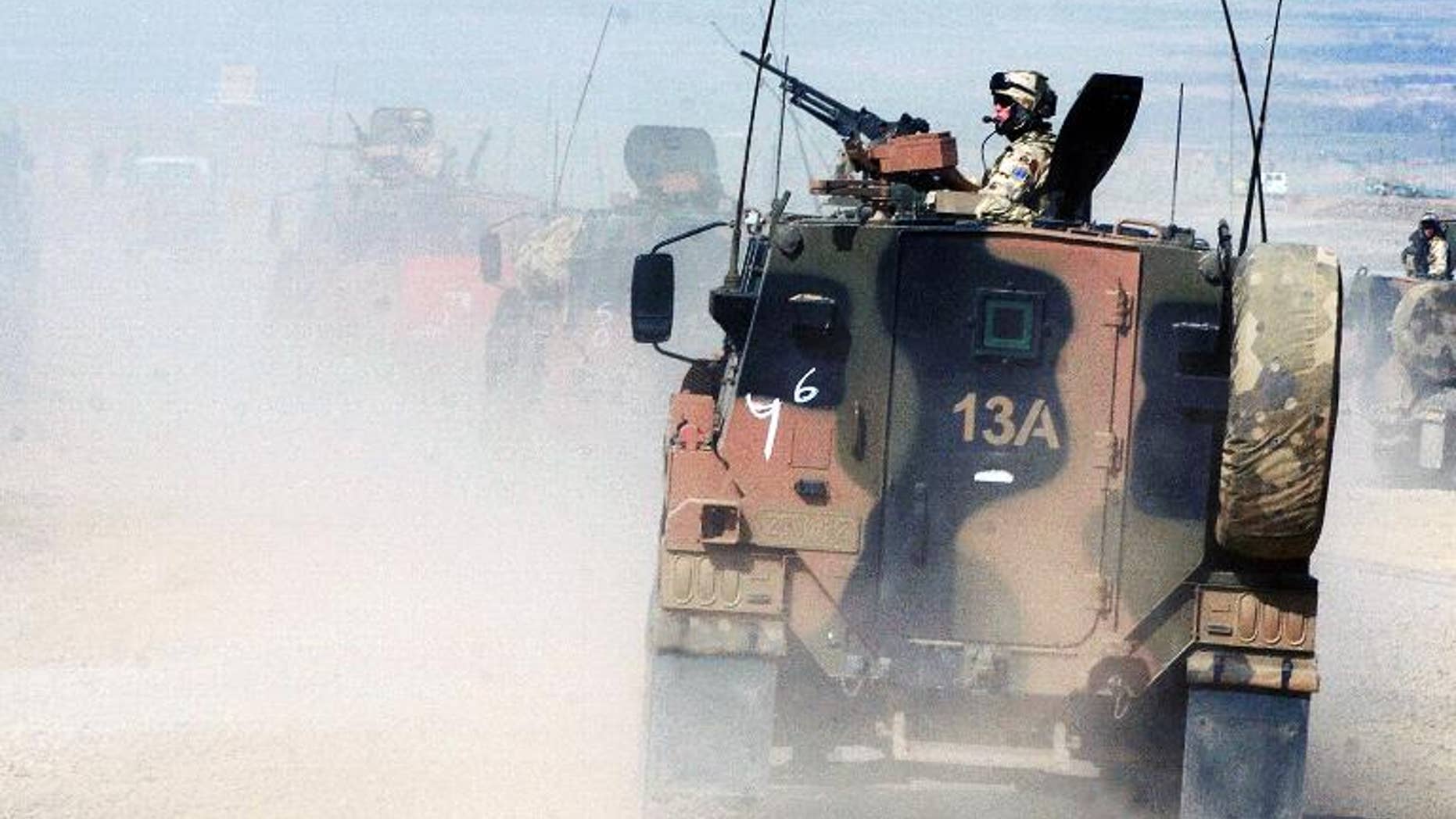 An Afghan soldier accused of shooting dead three Australian troops in an insider attack in Uruzgan province has been captured in Pakistan and is expected to be tried for murder